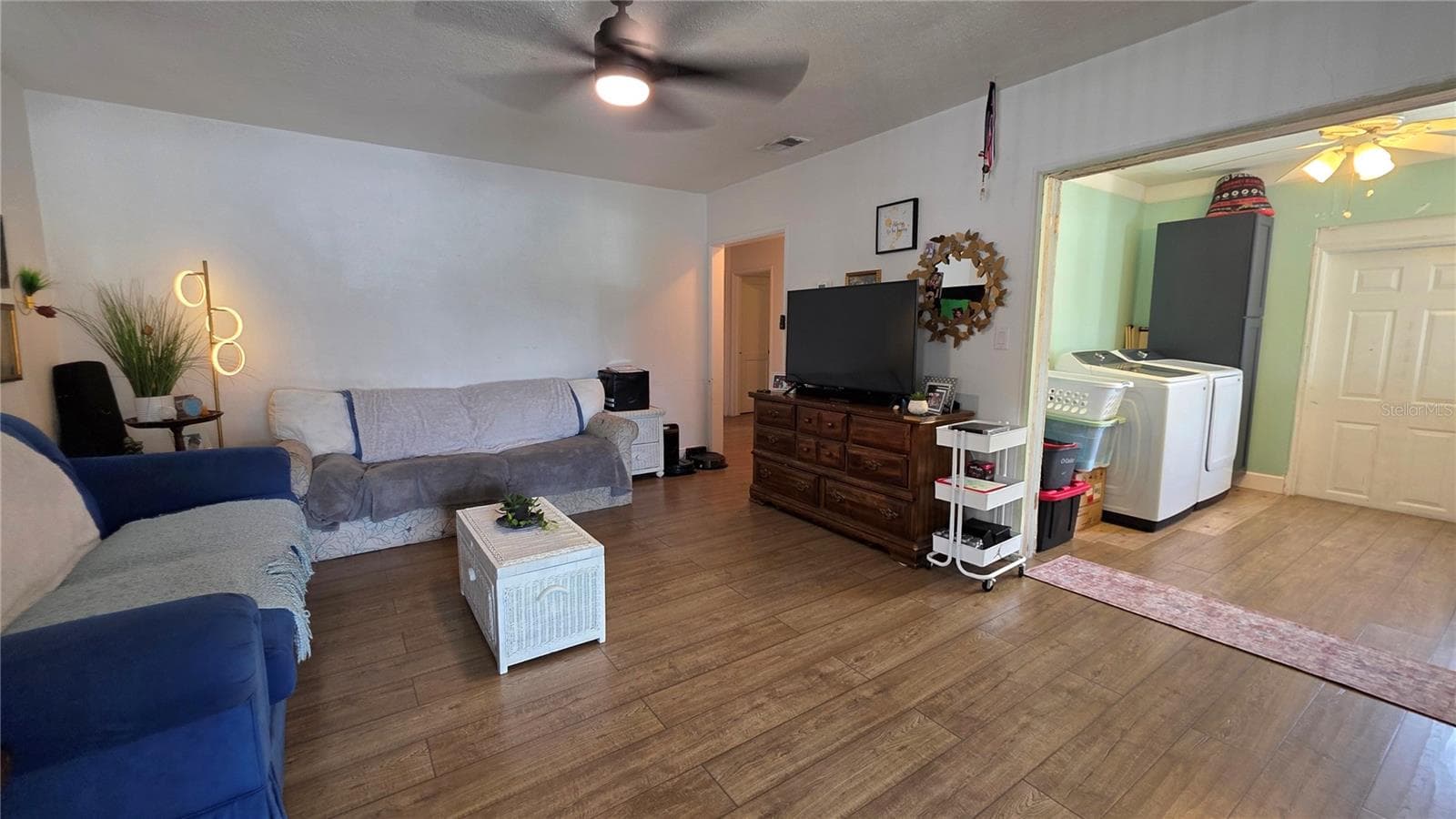 Living Room adjacent to Inside Laundry Area and Back Door - 1702 26TH ST W, BRADENTON