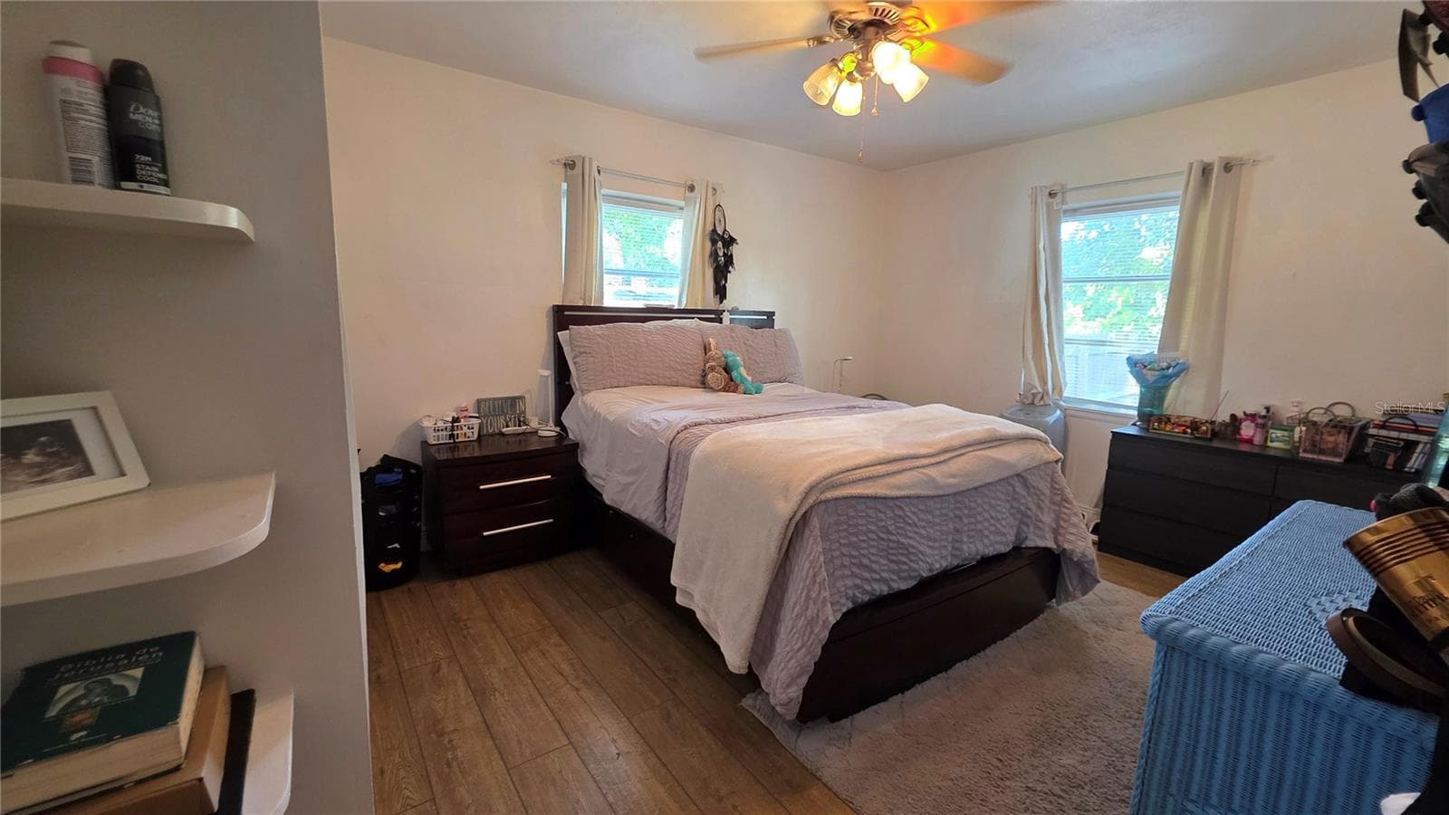 Primary Bedroom with 2 Windows, Laminate Flooring, and En-Suite Bathroom (non-functioning) - 1702 26TH ST W, BRADENTON