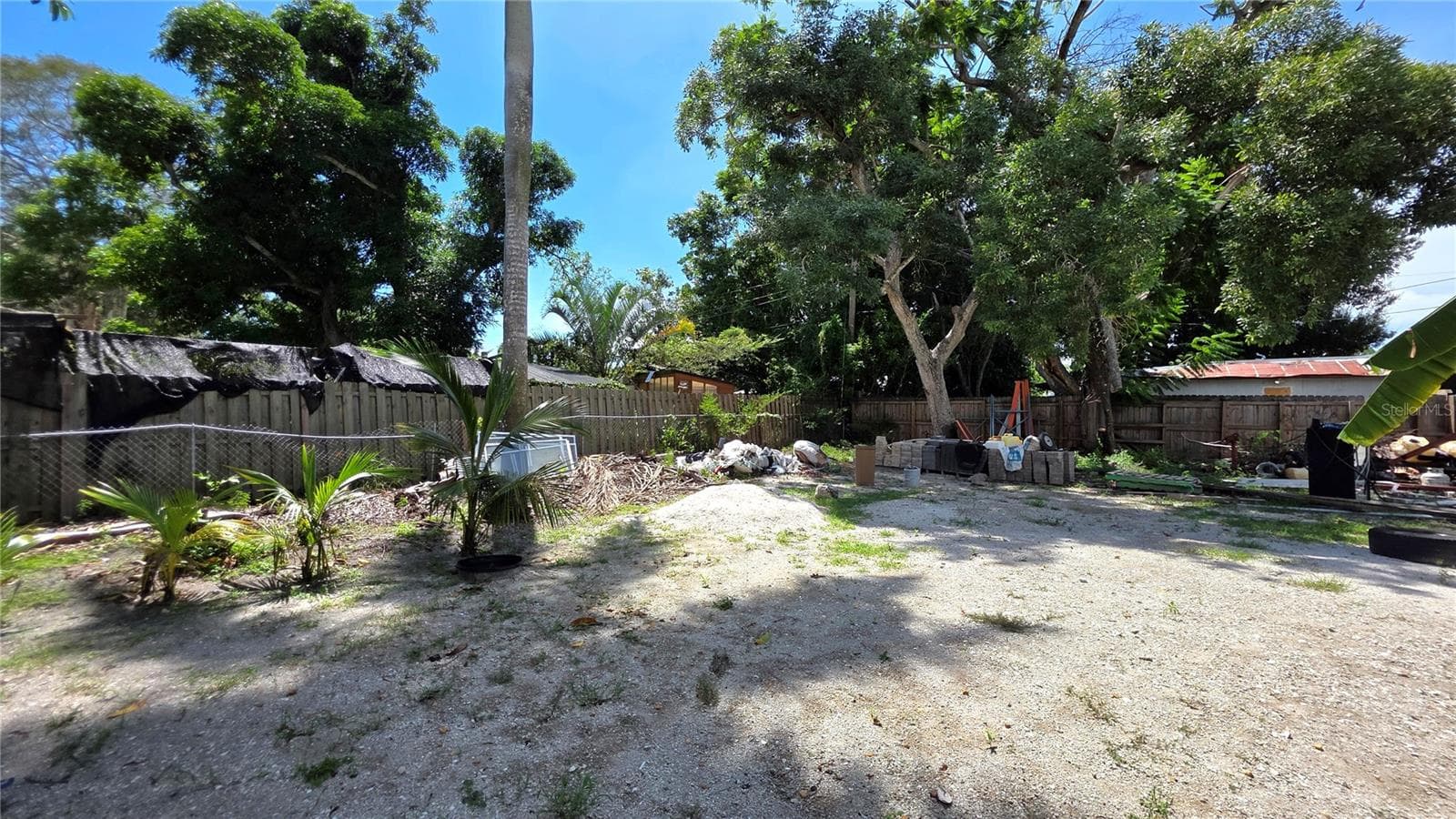 Backyard, Oversized Lot, Fully Fenced, Side driveway with Gated Entry to Backyard, Smaller Driveway on Back of Lot - 1702 26TH ST W, BRADENTON