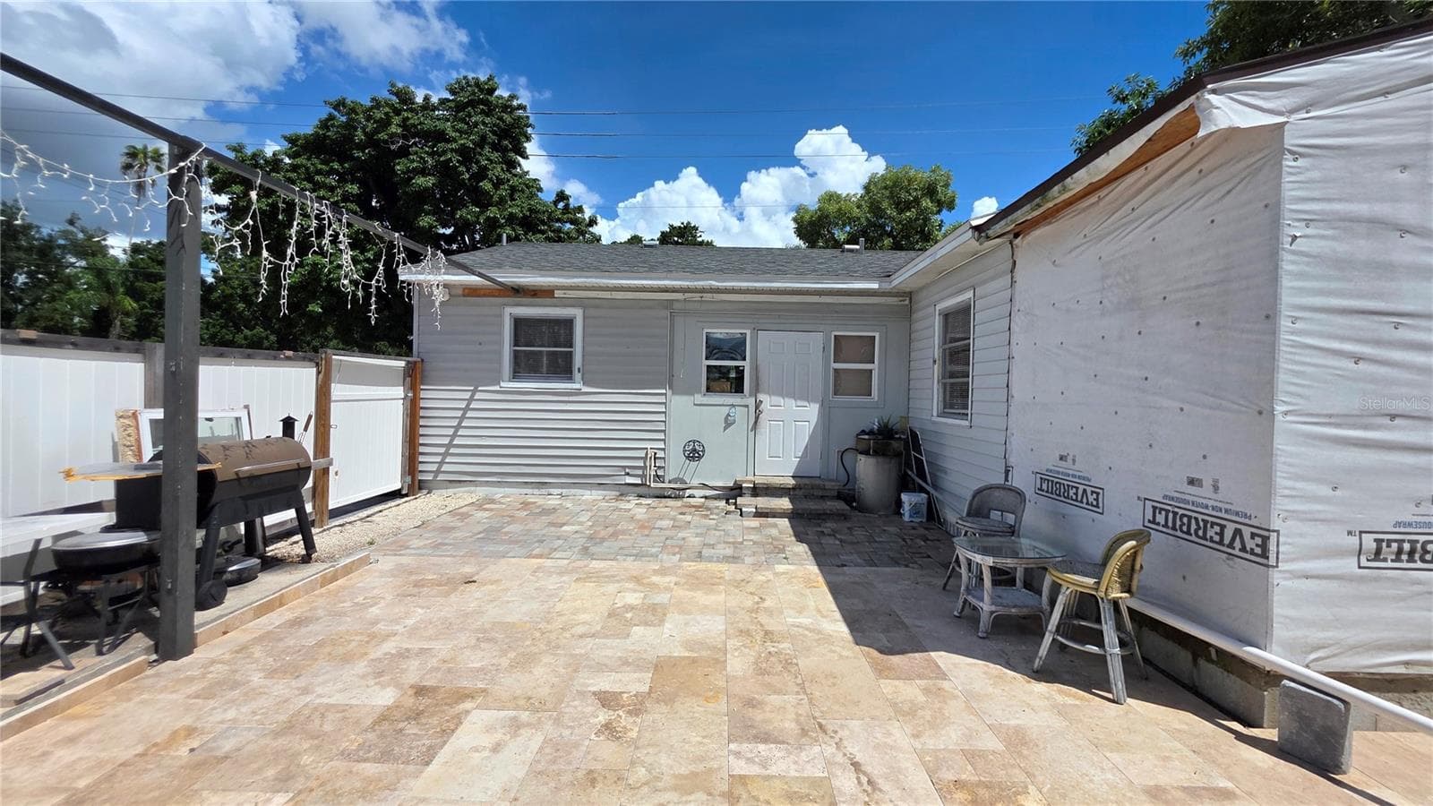 Back of Home, and Back Door Entry to Home. Addition partially added will need to be removed. - 1702 26TH ST W, BRADENTON