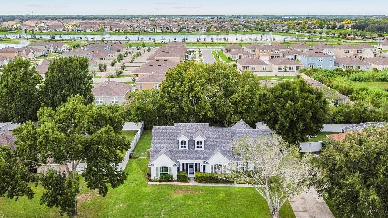 Aerial Views of home and neighborhood - 1508 JENNI LEE CT, KISSIMMEE