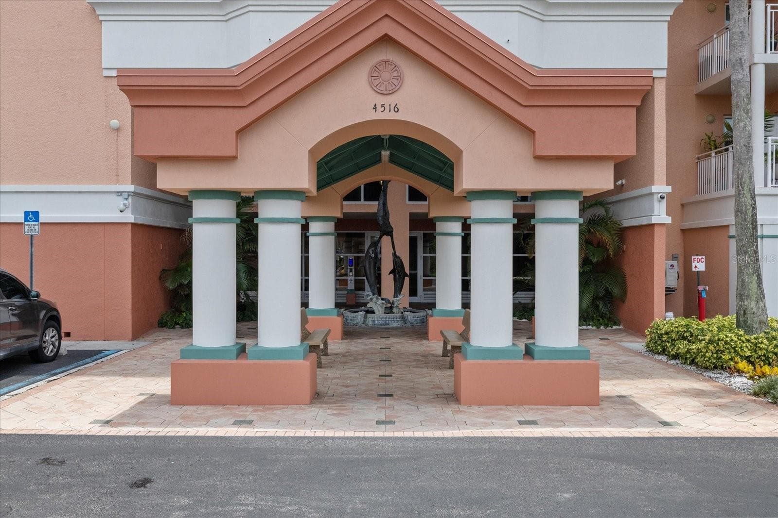 Front entrance with security entry. - 4516 SEAGULL DR #507, NEW PORT RICHEY