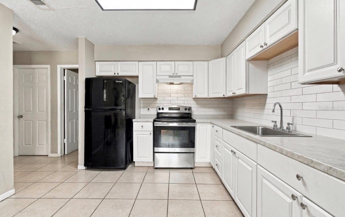 Duplex at 1504 E POINSETTIA AVE, TAMPA, photo 6 of 37