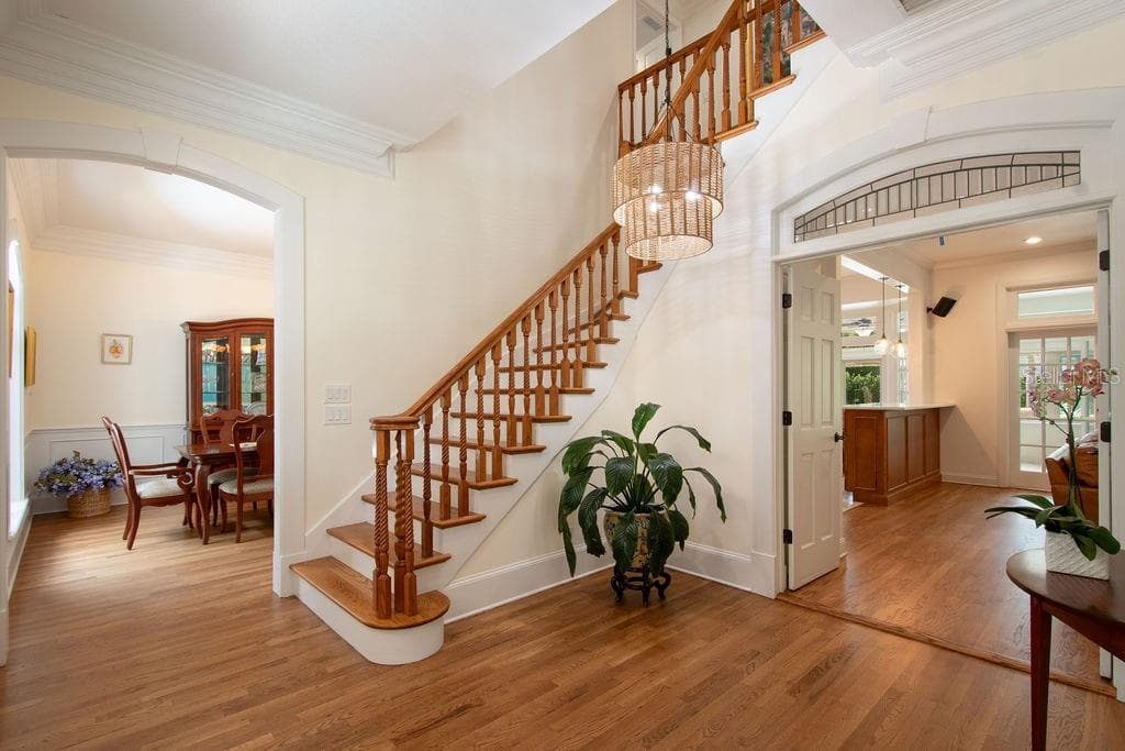 Foyer with dining room to the left, formal living room to the right. - 555 E LAKE SUE AVE, WINTER PARK