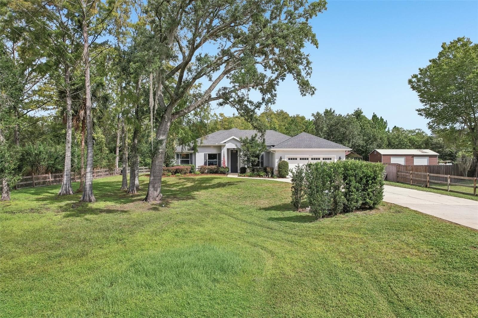 Set on approximately 1.24 ACRES, this BEAUTIFULLY MAINTAINED 4-bedroom, 3-bath POOL HOME offers an exceptional combination of space, privacy and thoughtful design in desirable Wedgefield. - 19179 SABAL ST, ORLANDO