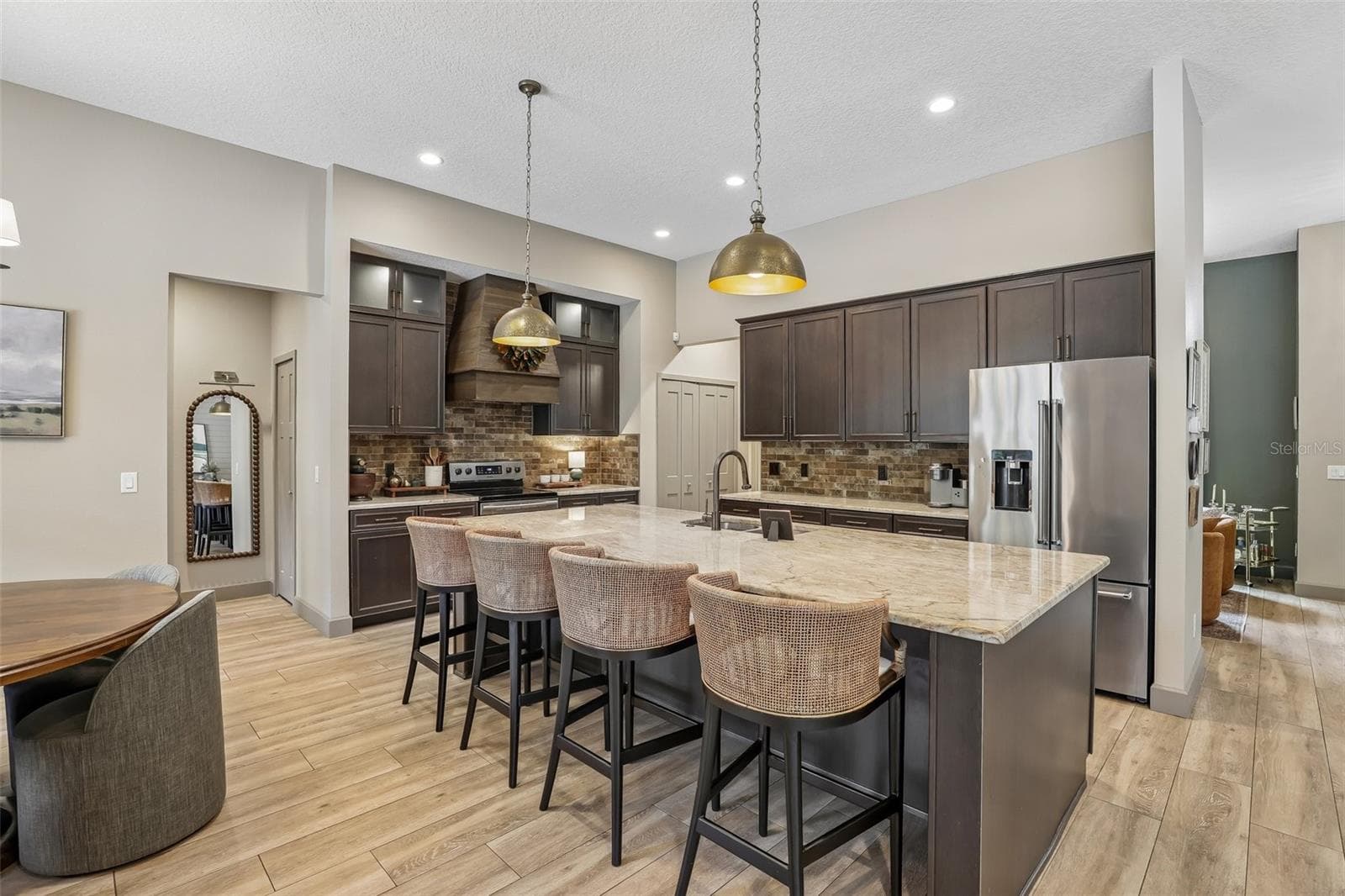 The Kitchen island includes space for counter-height seating. - 19179 SABAL ST, ORLANDO