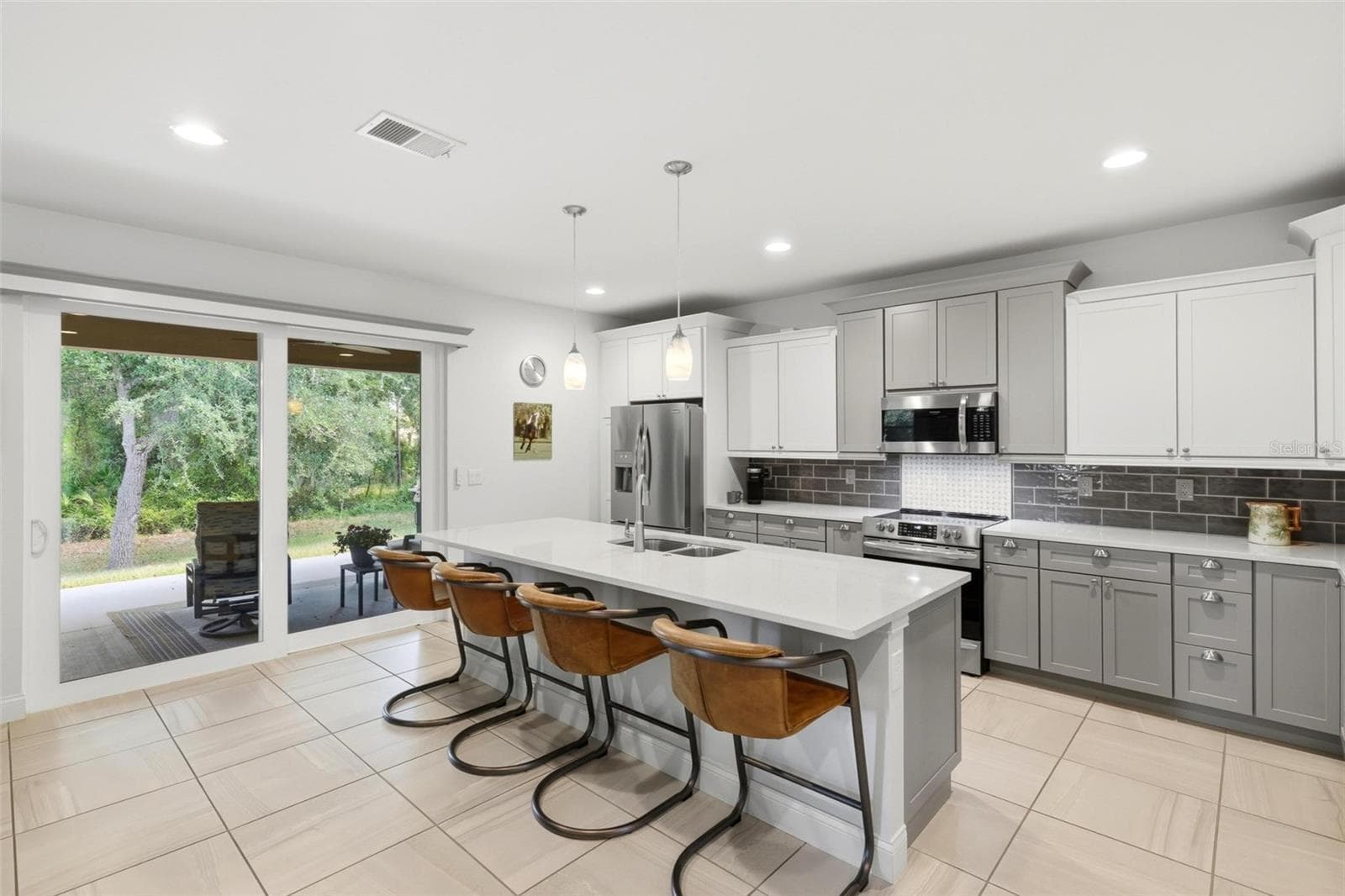 Kitchen with access to patio/lanai - 6172 ALHAMBRA AVE, NORTH PORT