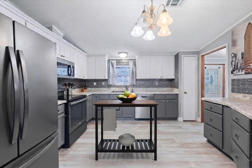 Virtually Staged Photo - 583 PORTSIDE DR, NORTH PORT