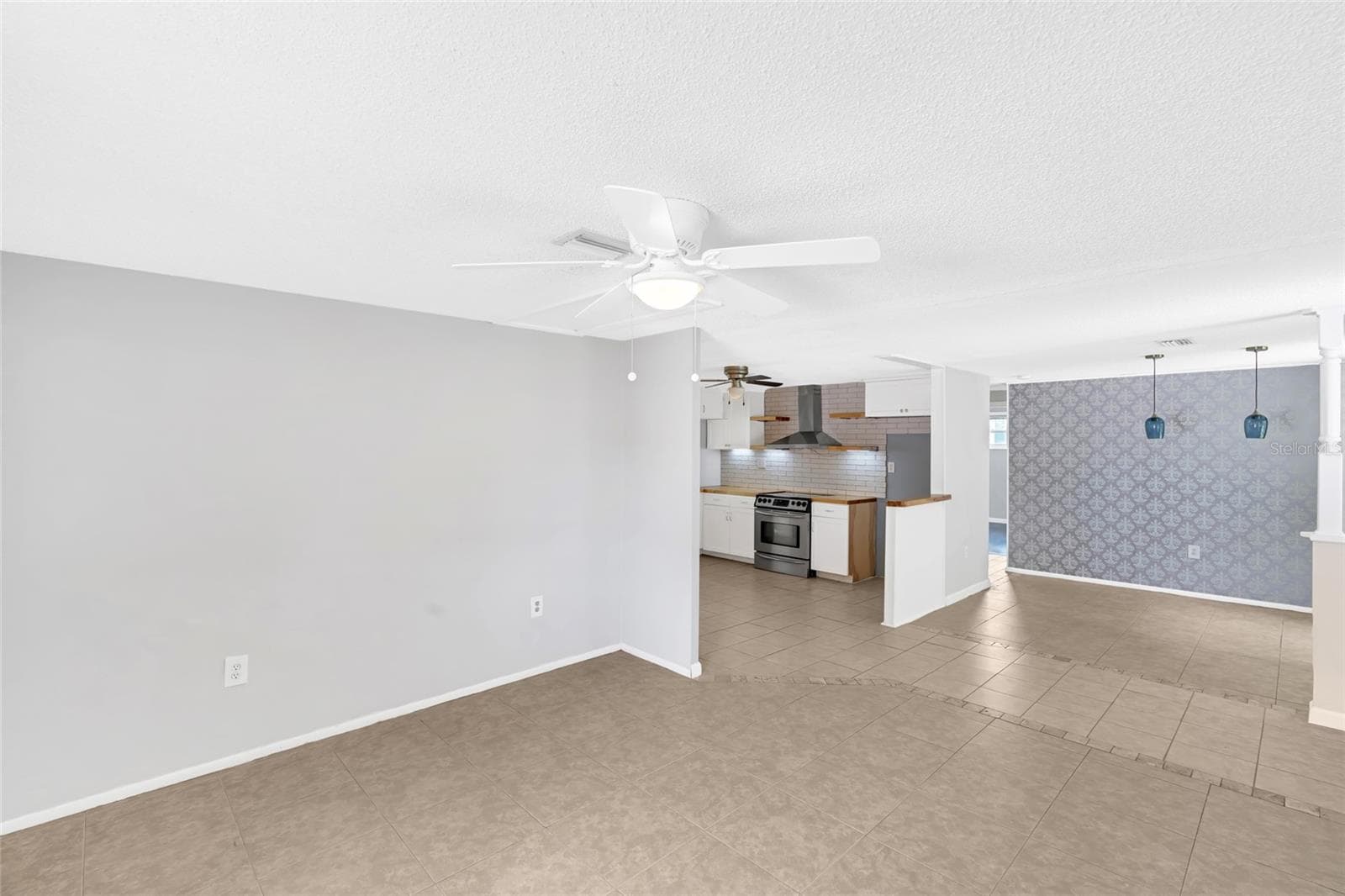 Multiple living and dining areas give this home the flexibility to fit everyday life, entertaining, guests and hobbies. - 142 2ND AVE, NOKOMIS