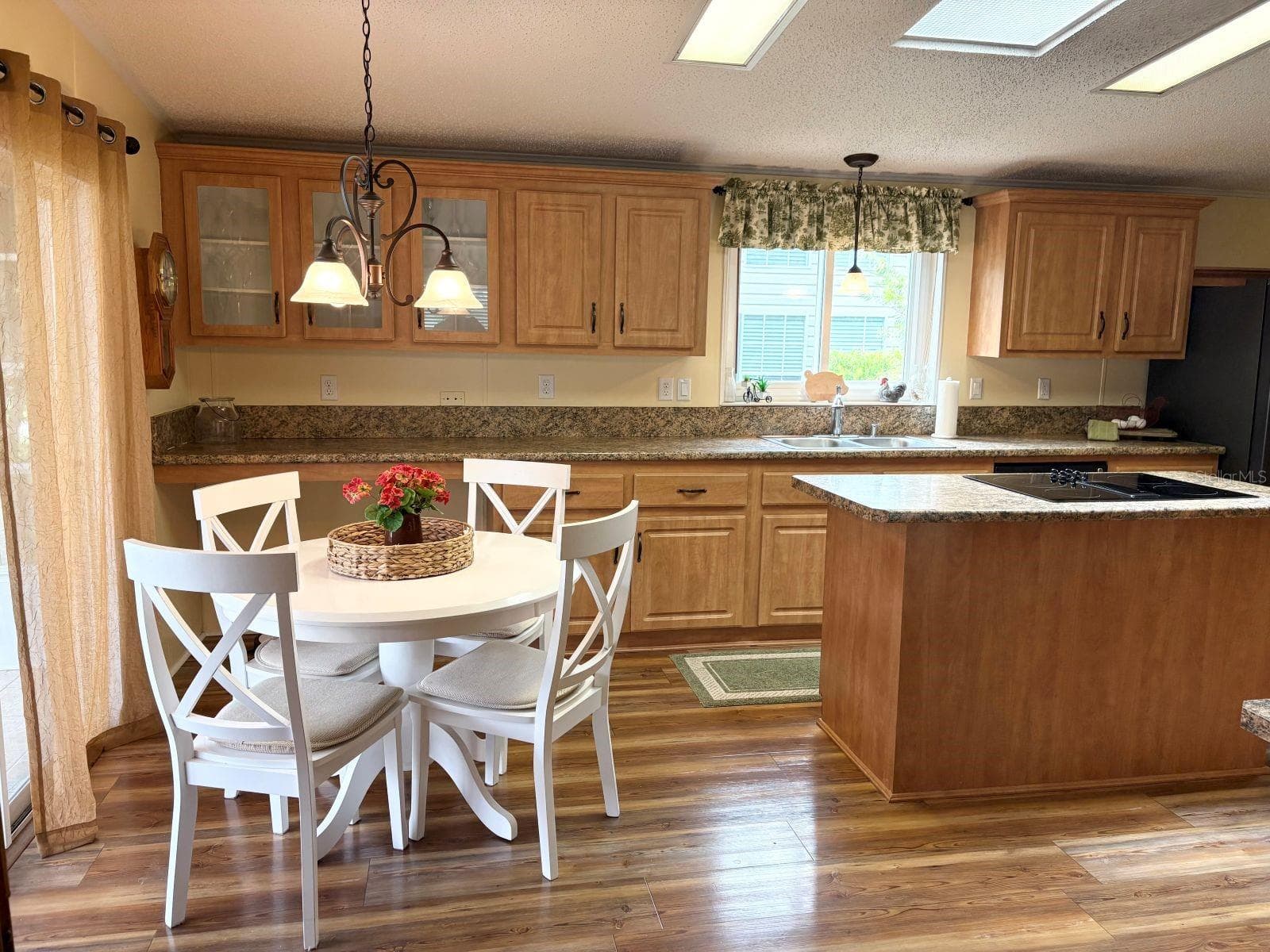 Eat in kitchen area along with breakfast bar or office area - 809 STARBOARD AVE, EDGEWATER