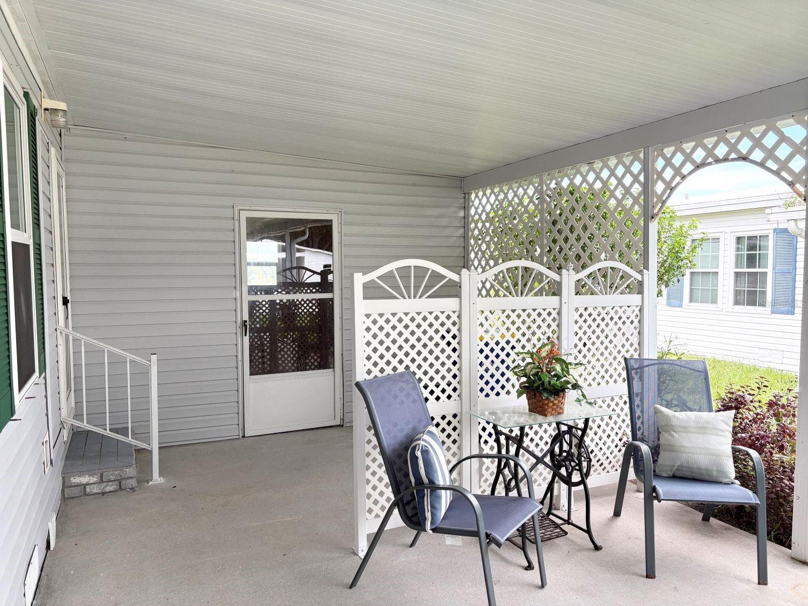 Covered carport and patio with storage shed - 809 STARBOARD AVE, EDGEWATER