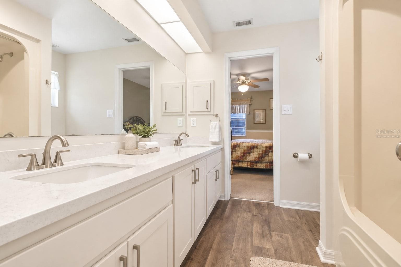 Virtually Staged - Jack and Jill Bathroom between Bedroom 2 and 3 - 13221 TOM GALLAGHER RD, DOVER