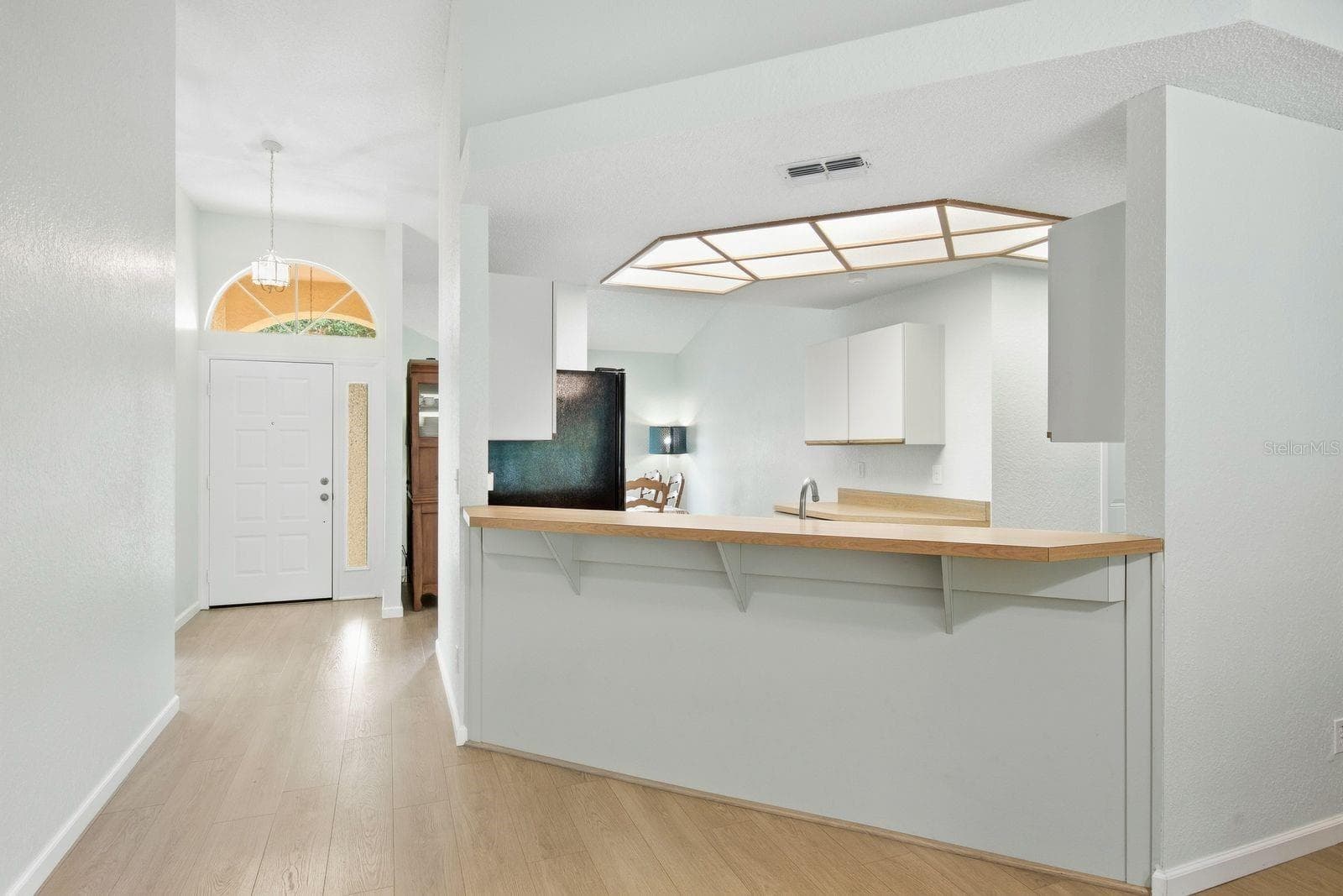 Bright kitchen with convenient counter space. - 5955 107TH TER N, PINELLAS PARK