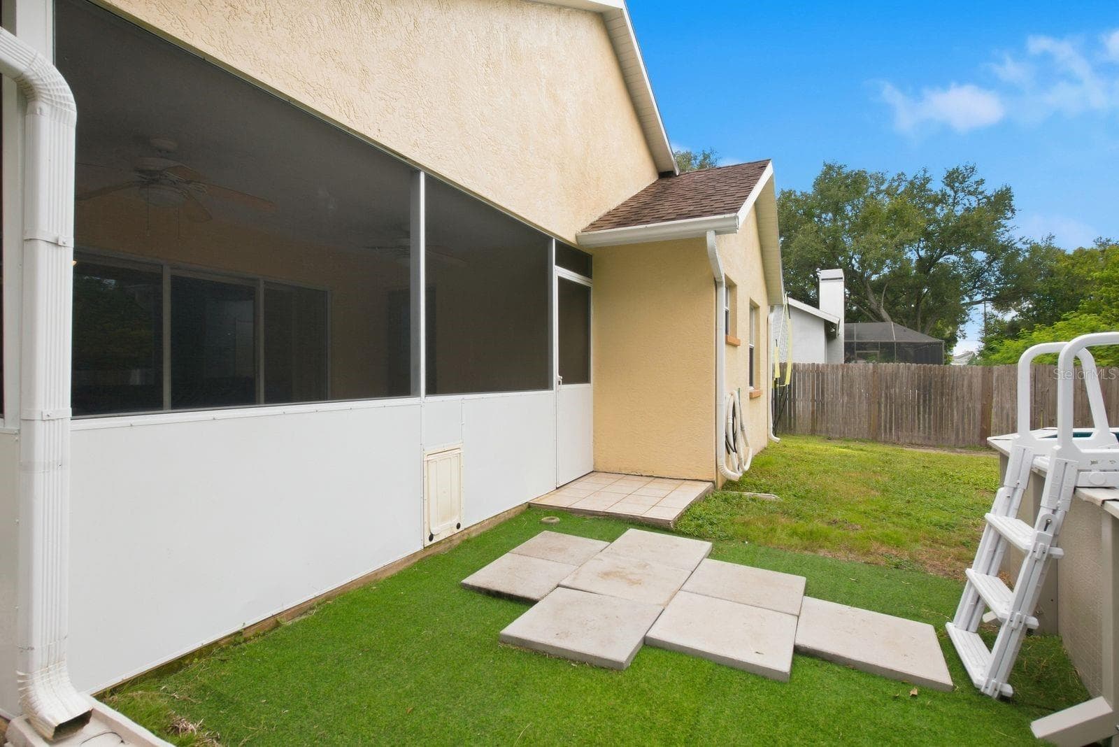Nice area from patio to pool - 5955 107TH TER N, PINELLAS PARK