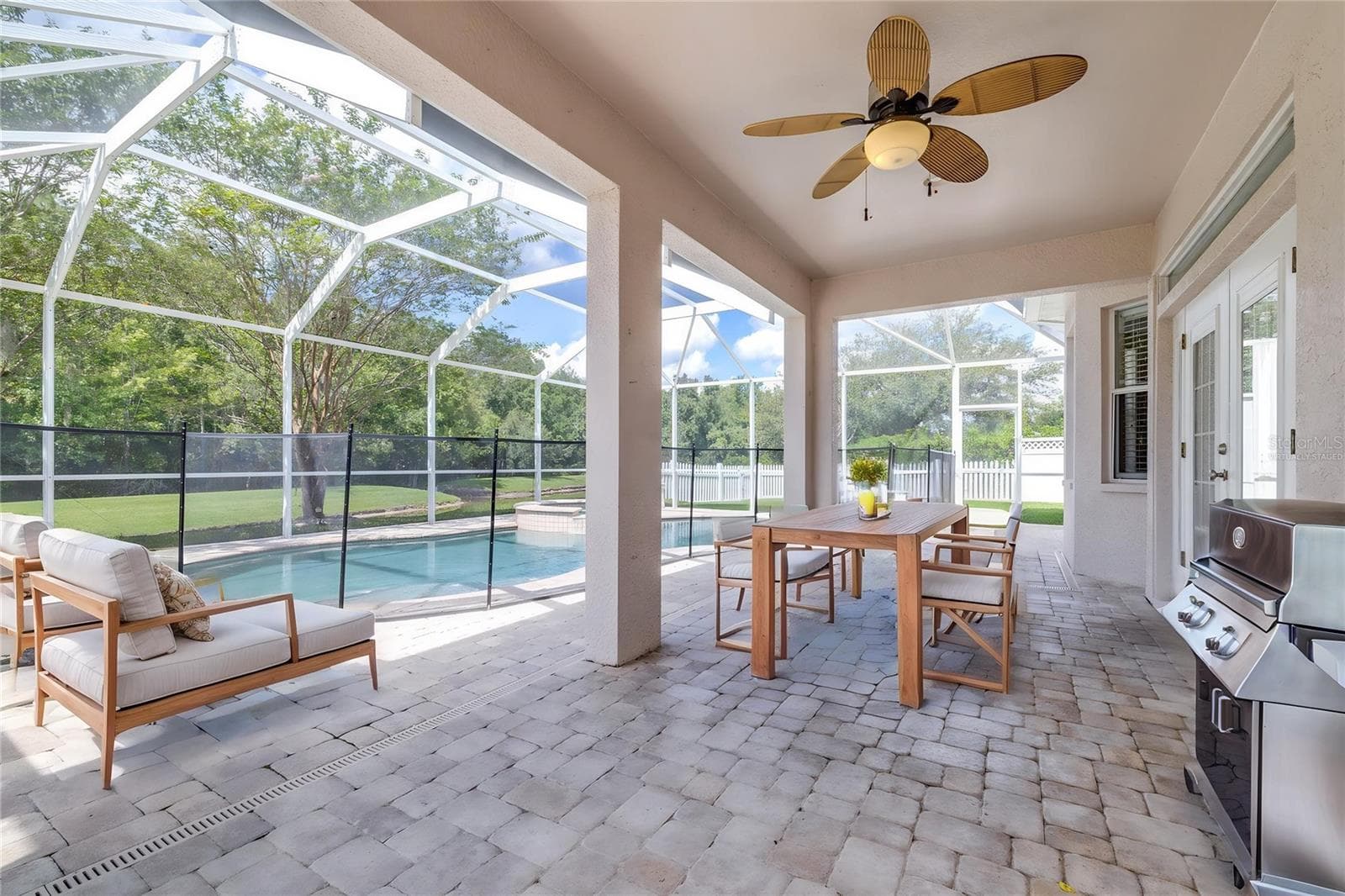 Virtually staged lanai - 27015 FIREBUSH DR, WESLEY CHAPEL