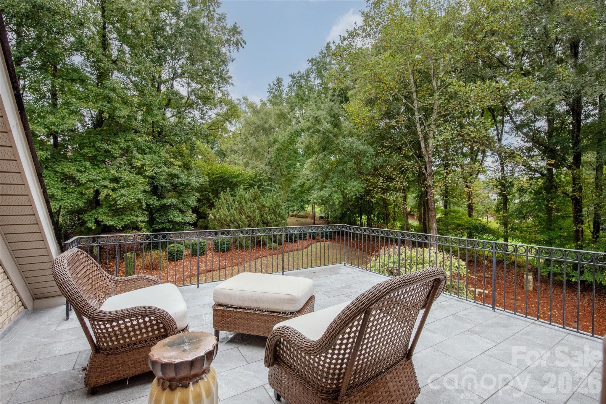 Enjoy beautiful views from the primary suite terrace - 1005 Firethorne Club Drive, Marvin