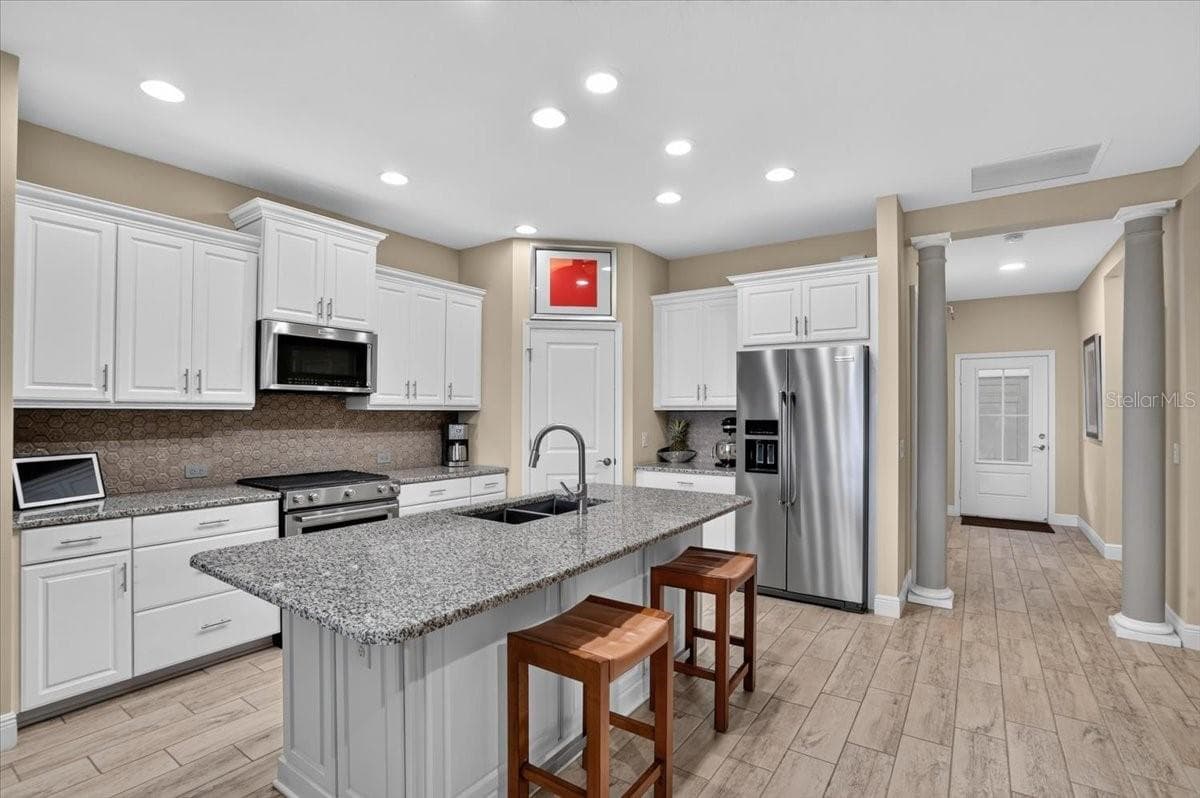 Kitchen With Island - 11241 MCDERMOTT CT, ENGLEWOOD