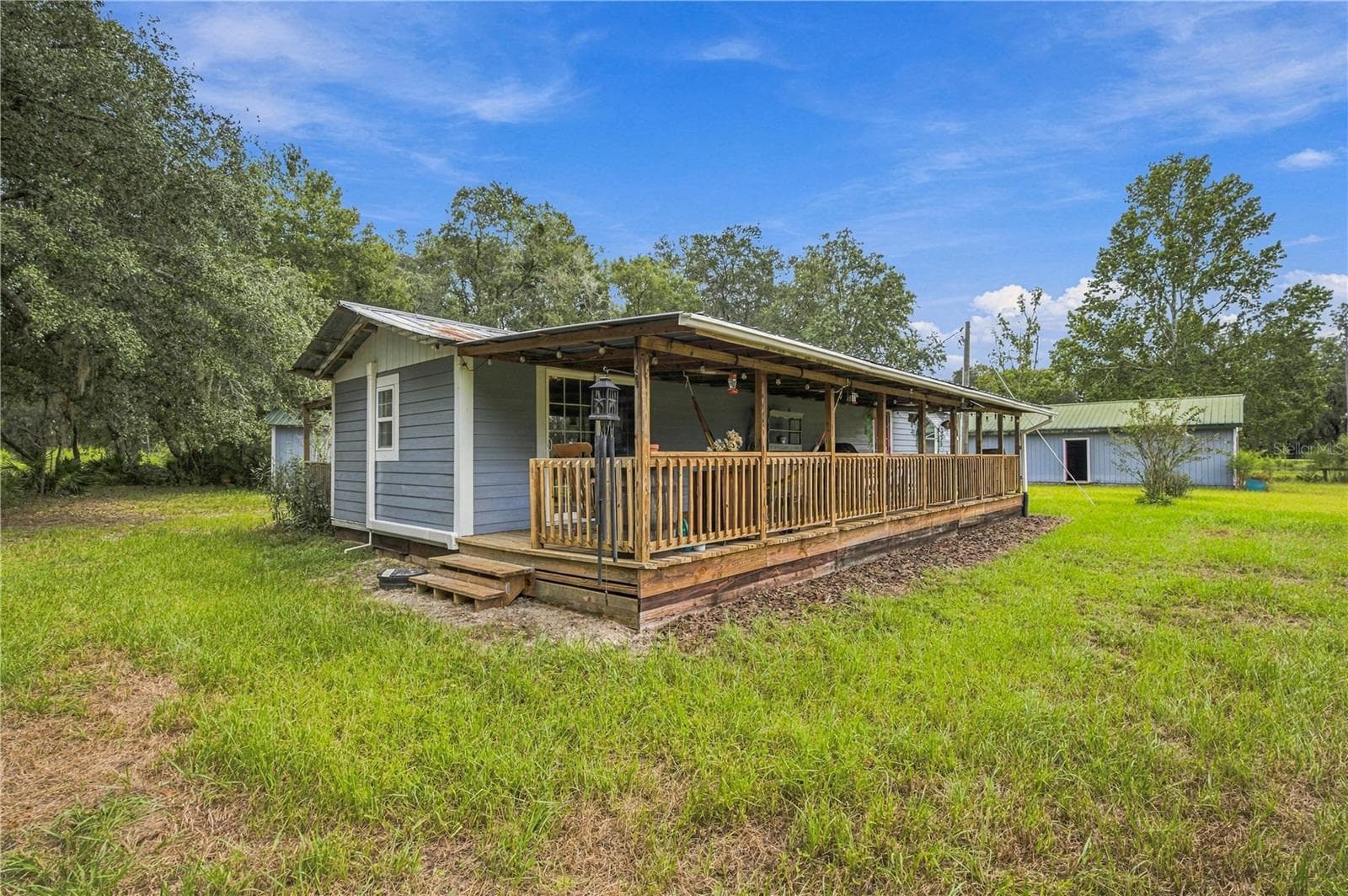 Manufactured Home at 14468 NE 150TH AVE, FORT MC COY, photo 4 of 51