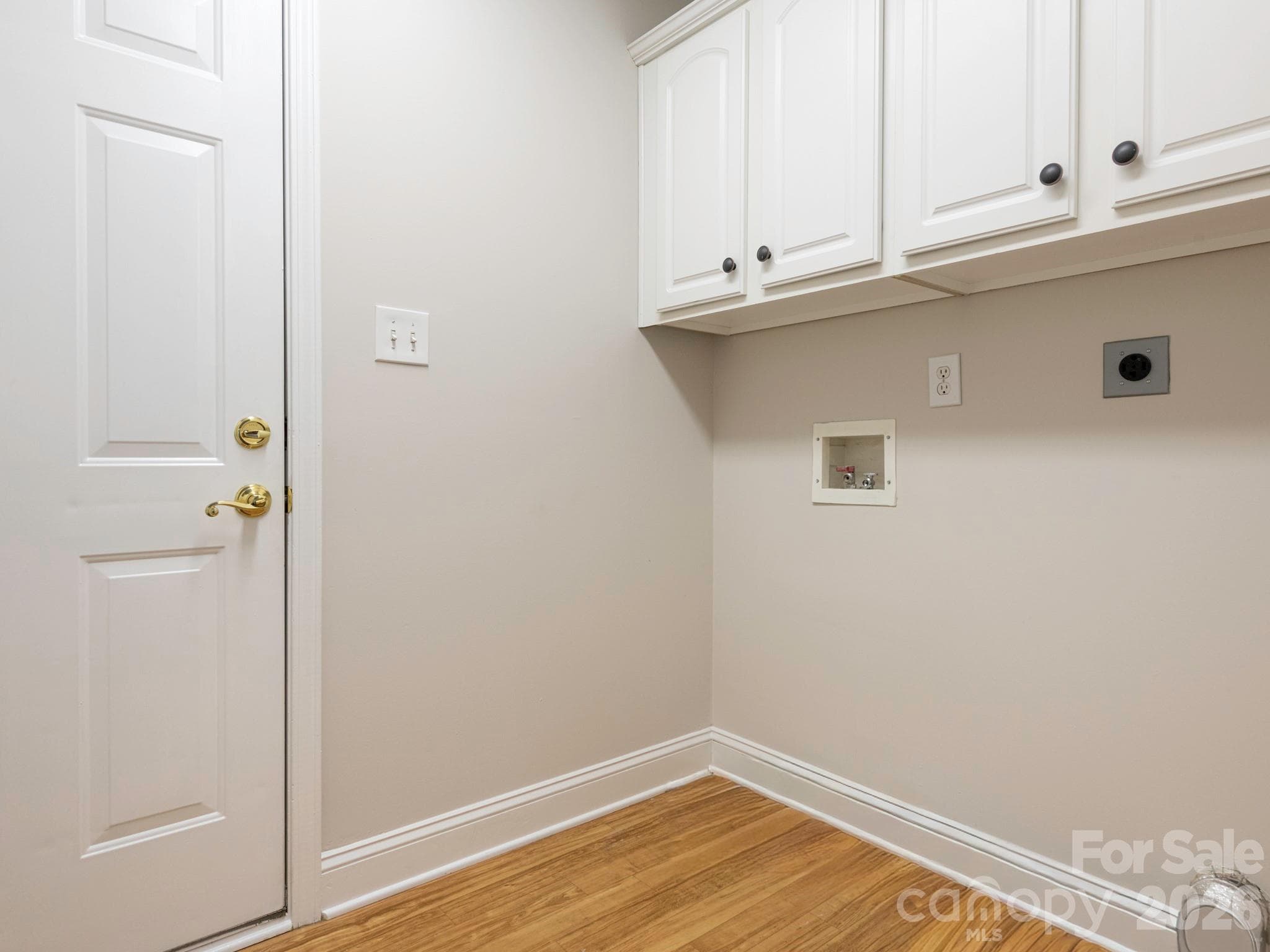 laundry with extra storage - 785 Treva Anne Drive SW, Concord