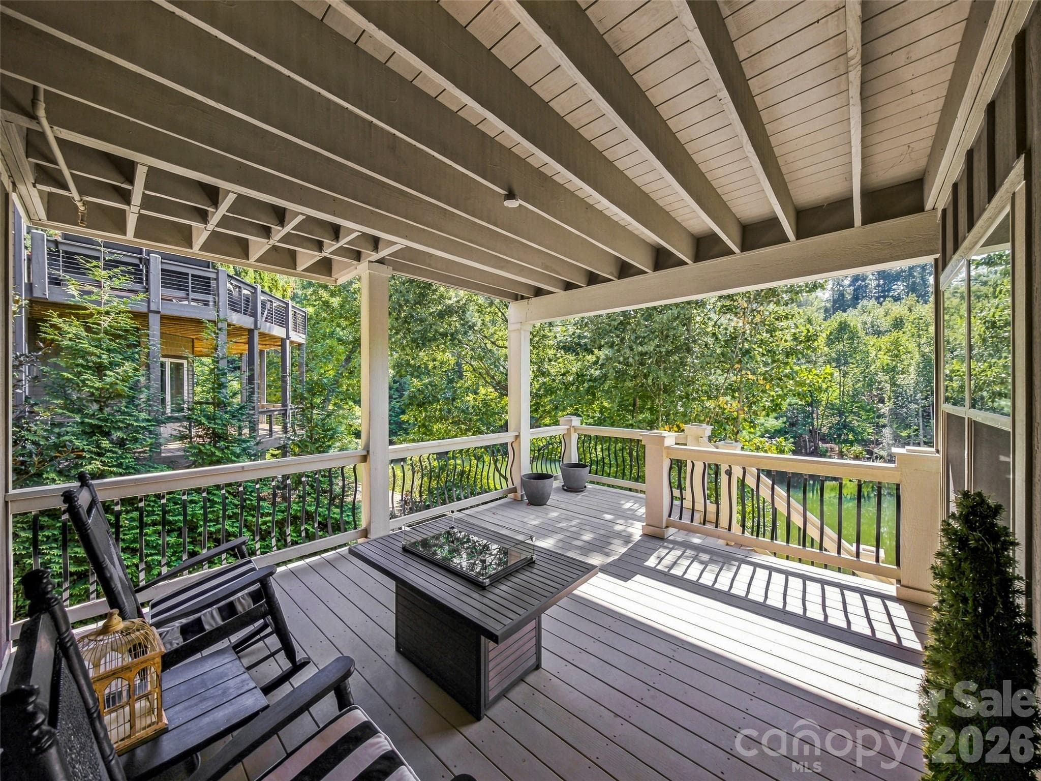 Lower Level covered porch with stairs to the fishing lake. - 158 Narrows Run Loop, Hendersonville