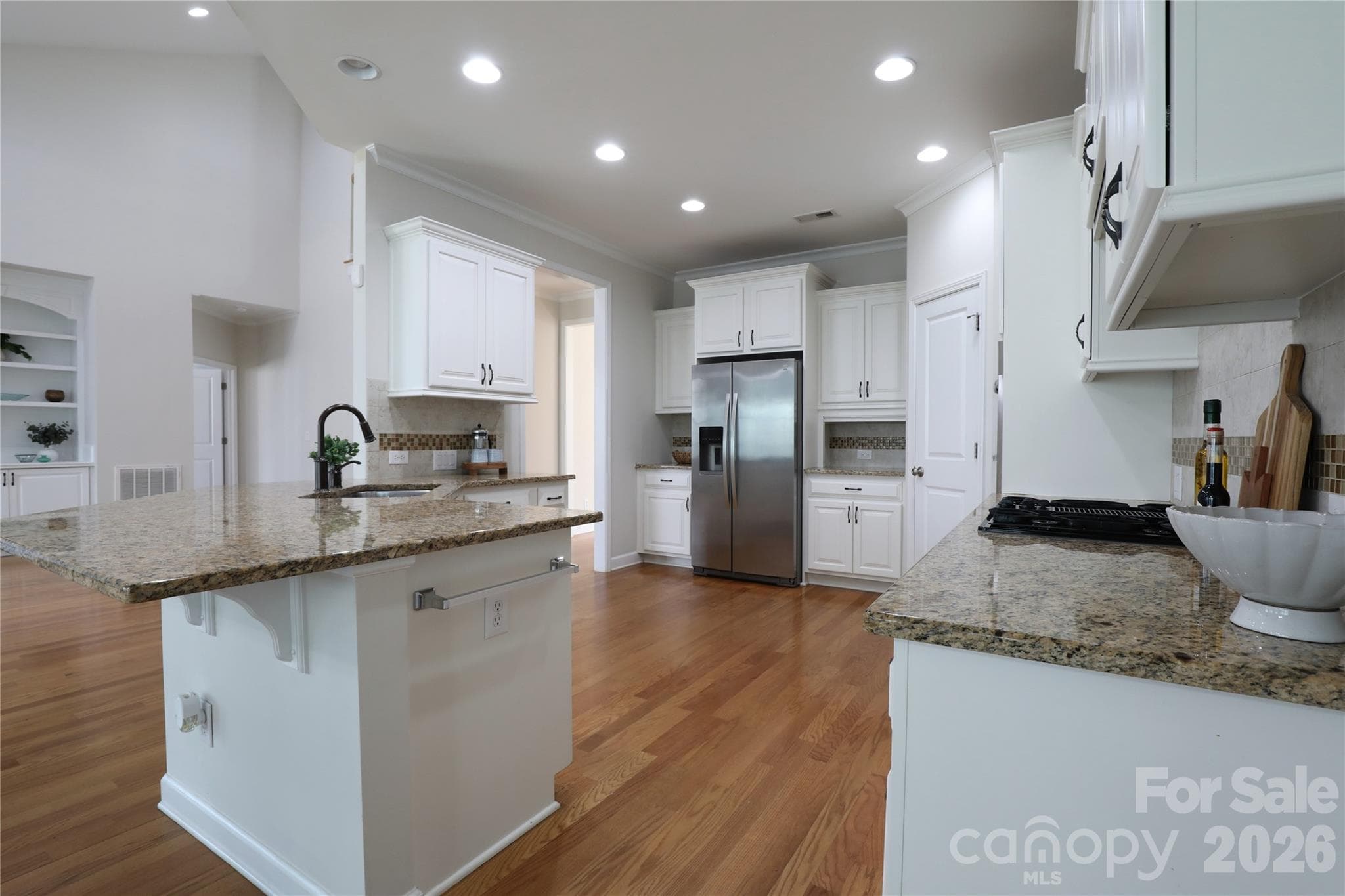 Walk in pantry and ample cabinetry in this gourmet kitchen - 18465 E Marbella Lane, Fort Mill