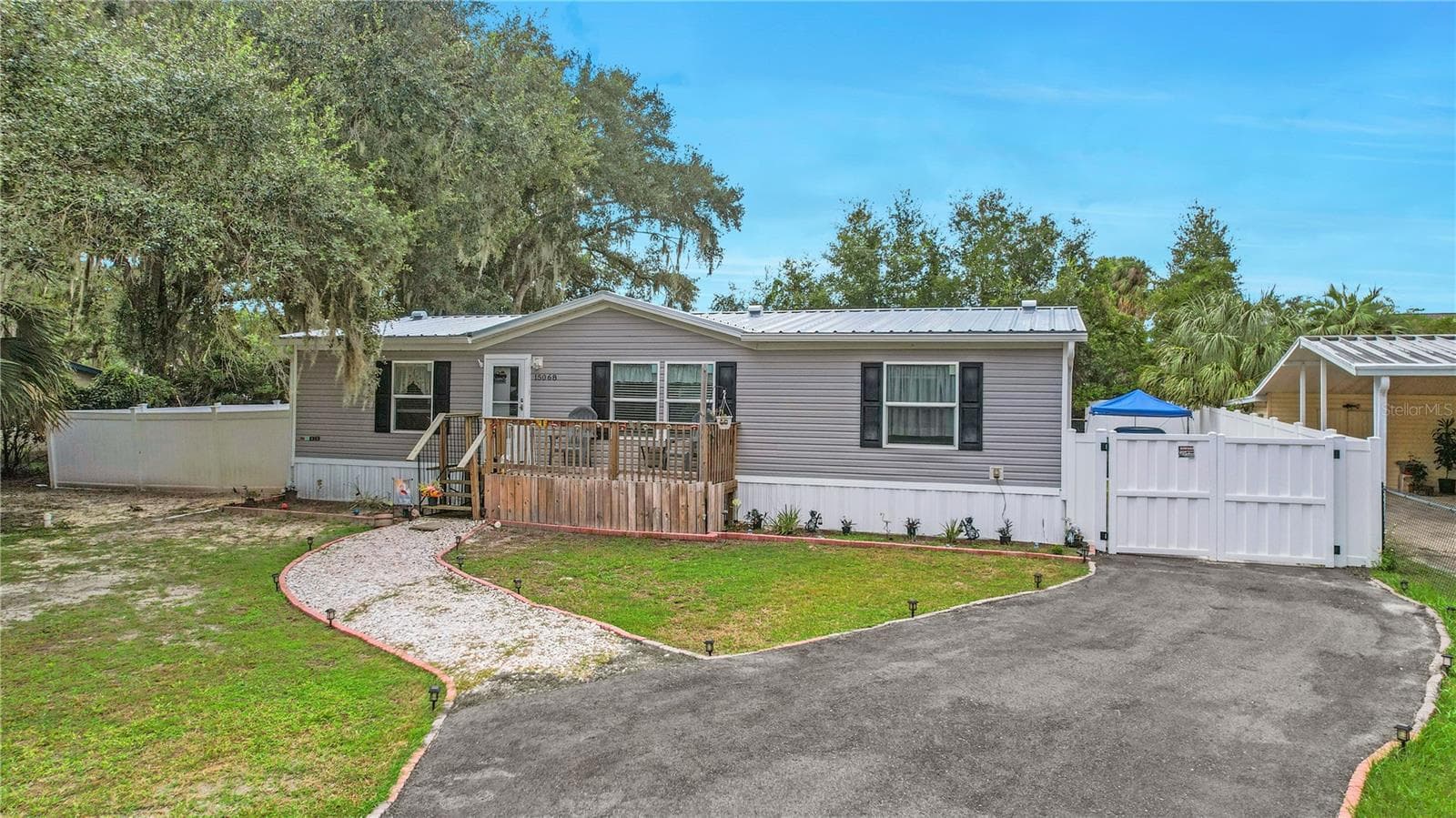 Manufactured Home at 15068 SE 105TH AVE, SUMMERFIELD, photo 6 of 36