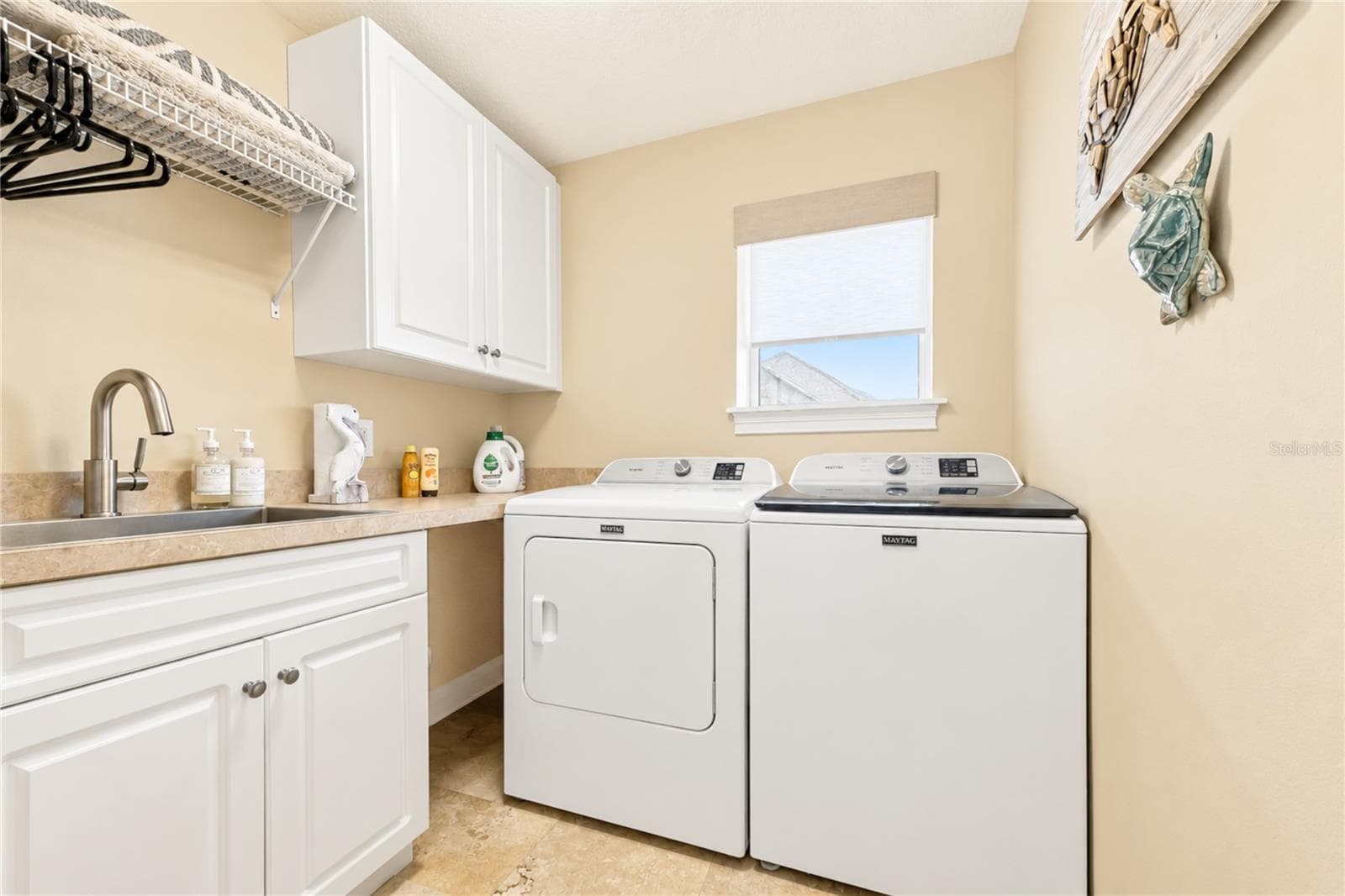 First-Level Laundry Room with Sink - 3399 N OCEAN SHORE BLVD, FLAGLER BEACH