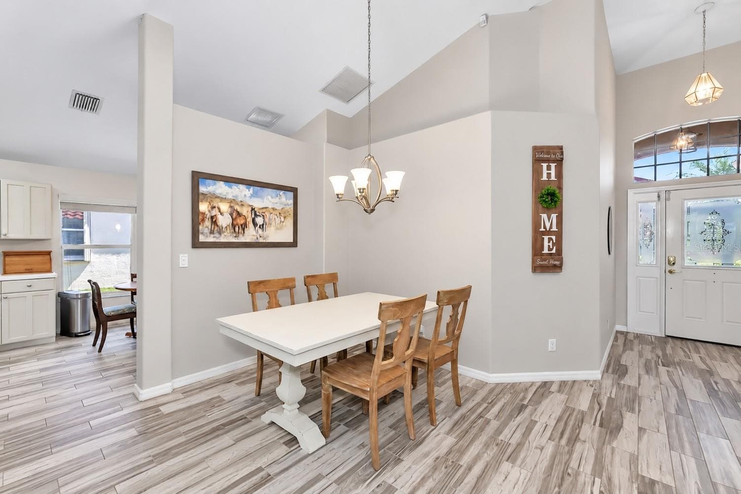 Plank tile flooring living areas and bedrooms. - 5113 FLAGSTONE DR, SARASOTA