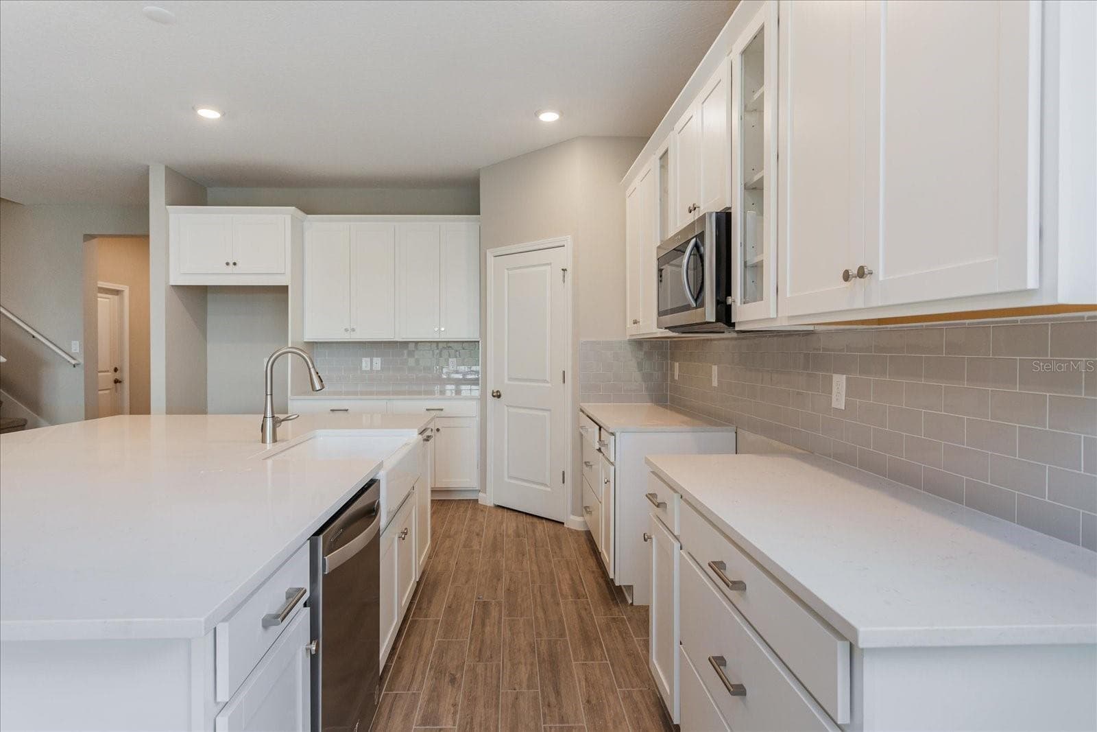 Note: The sample photos included are of the model home and are meant to showcase the craftsmanship and design quality. - 13326 PEACEFUL MELODY DR, WINTER GARDEN