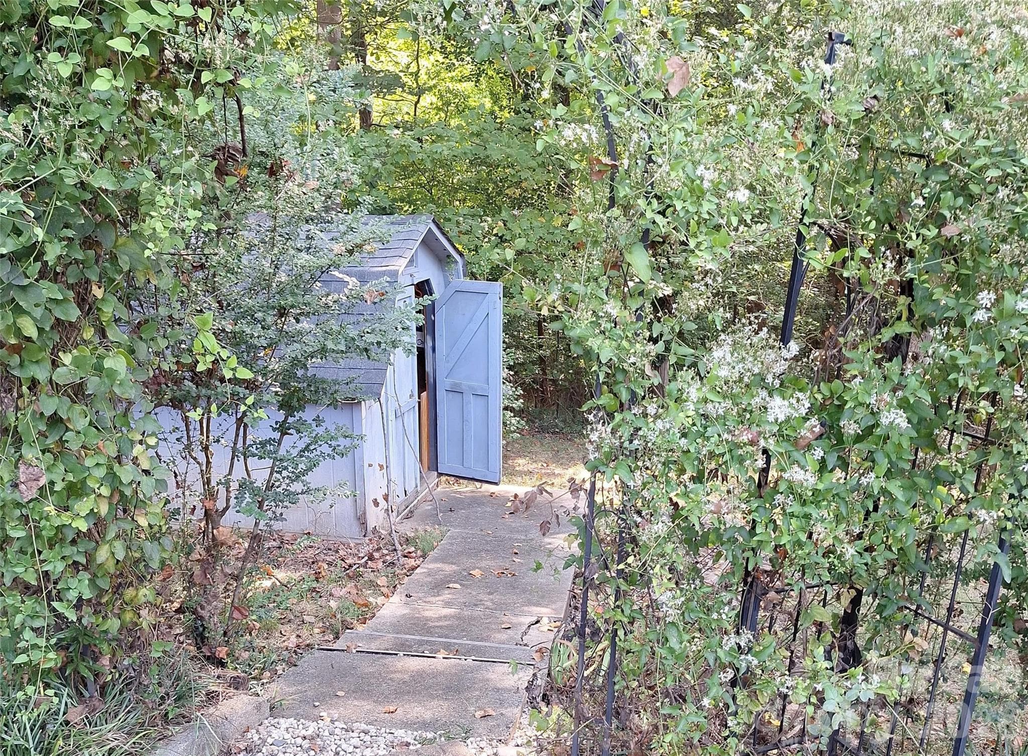 Storage shed tucked into the trees! - 1910 Wildwood Road, Gastonia