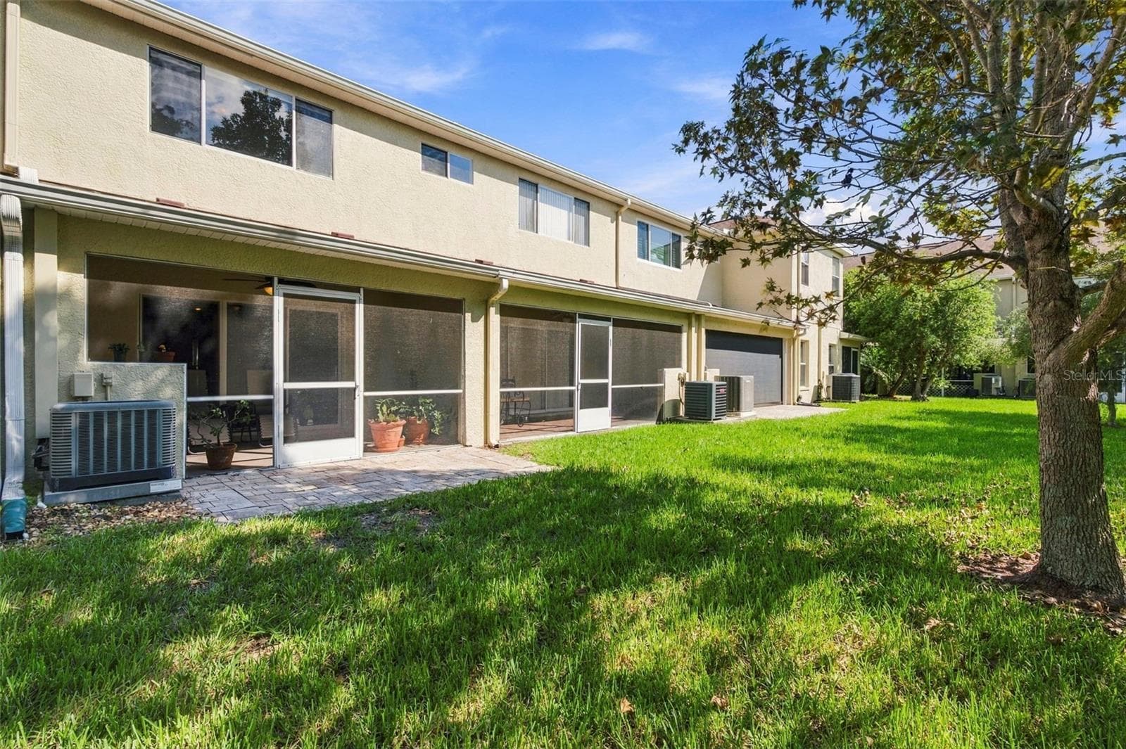 Looking at the back of the home - 11193 KAPOK GRAND CIR, SEMINOLE