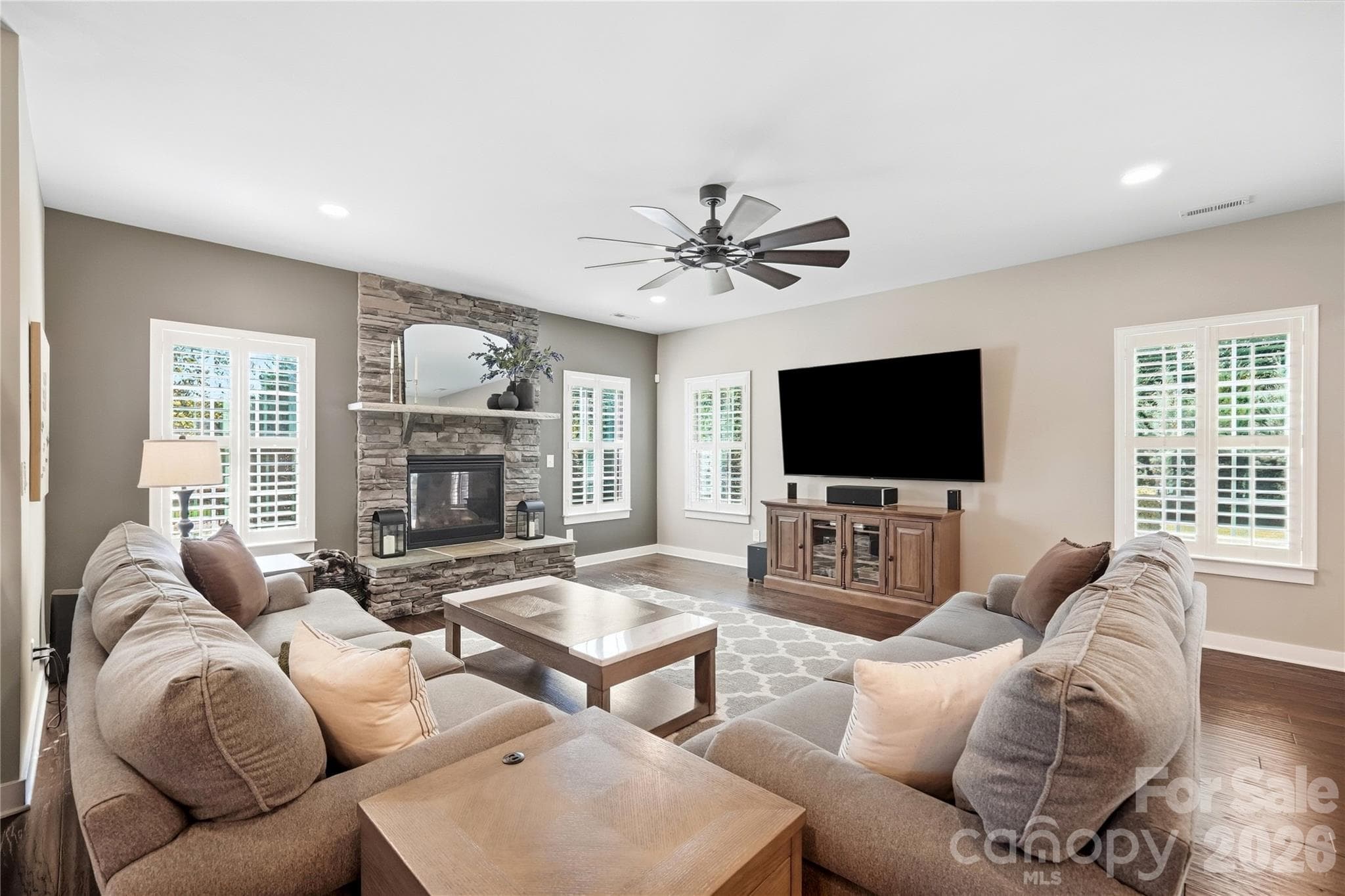 Spacious family room with abundant natural light and plenty of room for large gatherings. - 912 Manorwood Drive, Waxhaw