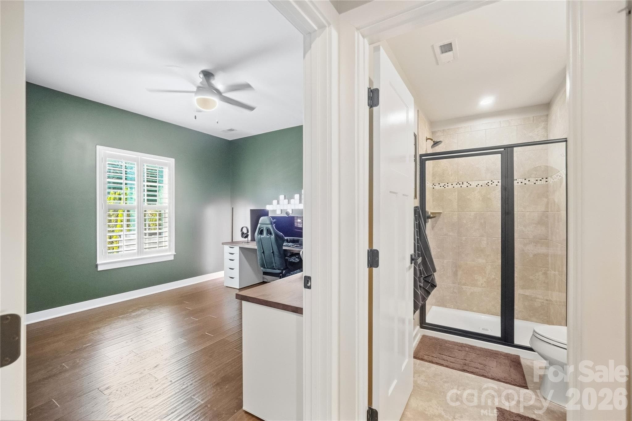 Main-level study with a full bath just steps away, an easy setup for a guest space, home gym, or second office. - 912 Manorwood Drive, Waxhaw