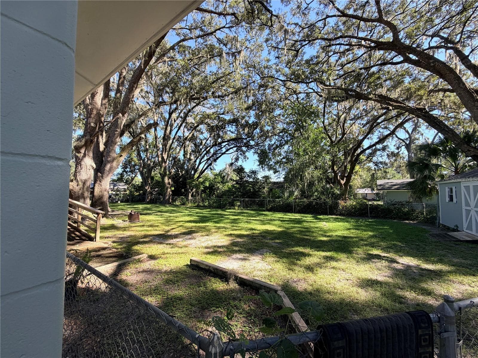 View from side driveway - 1774 NE 12TH ST, OCALA