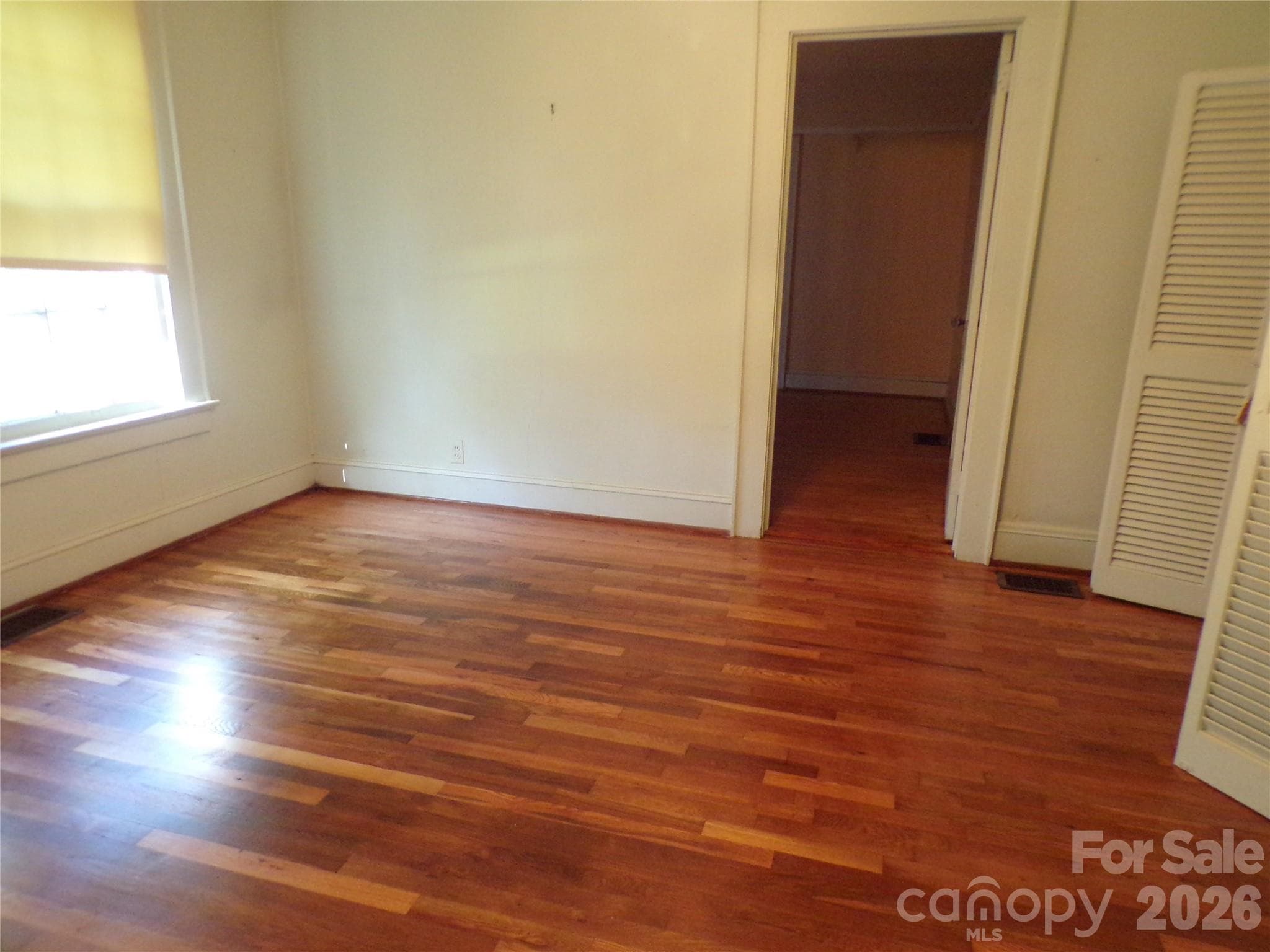 Bedroom Refinished Hardwood Flooring - 608 1st Street W, Conover