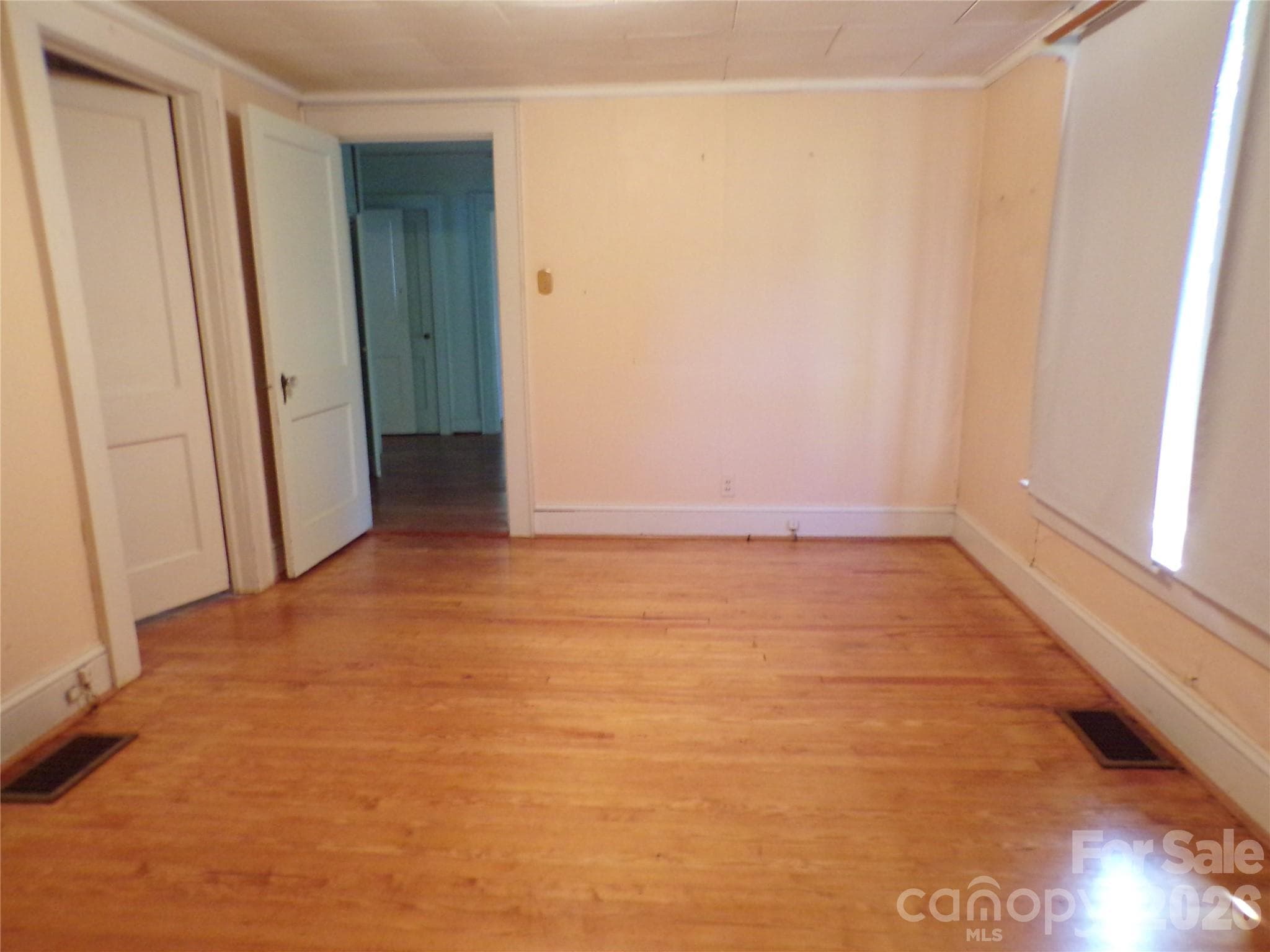 Bedroom Refinished Hardwood Flooring - 608 1st Street W, Conover