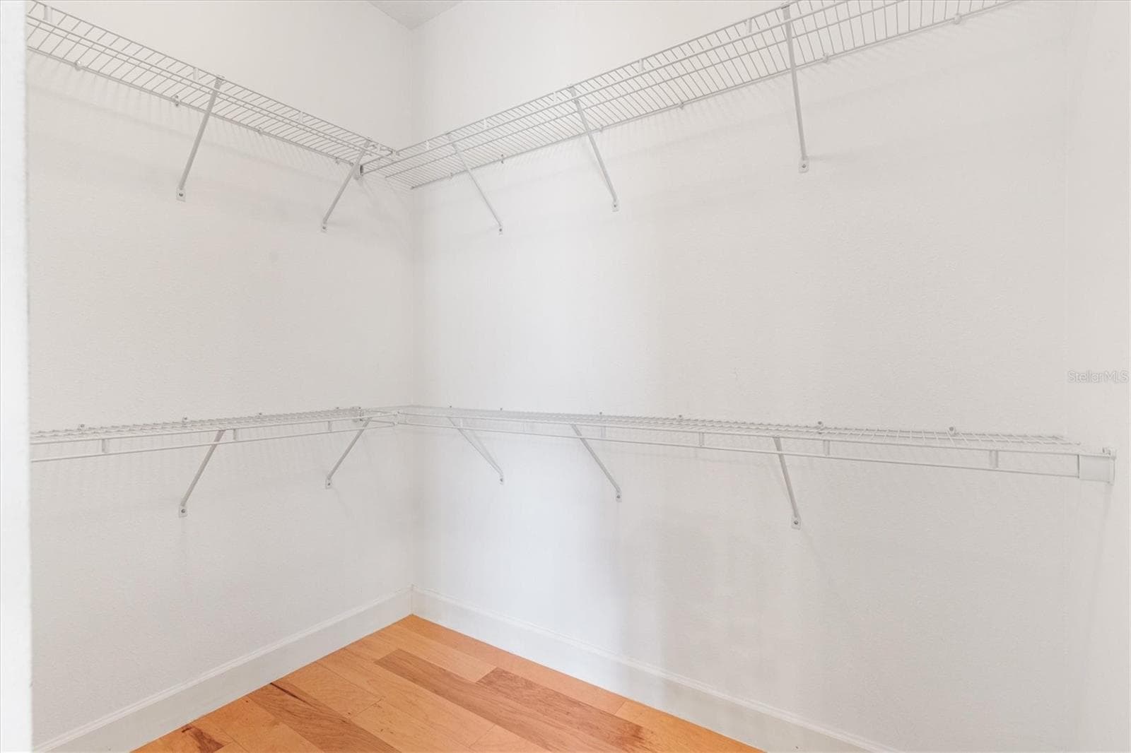 SPLIT WALK-IN CLOSET - 1025 WINNSBORO DR, THE VILLAGES