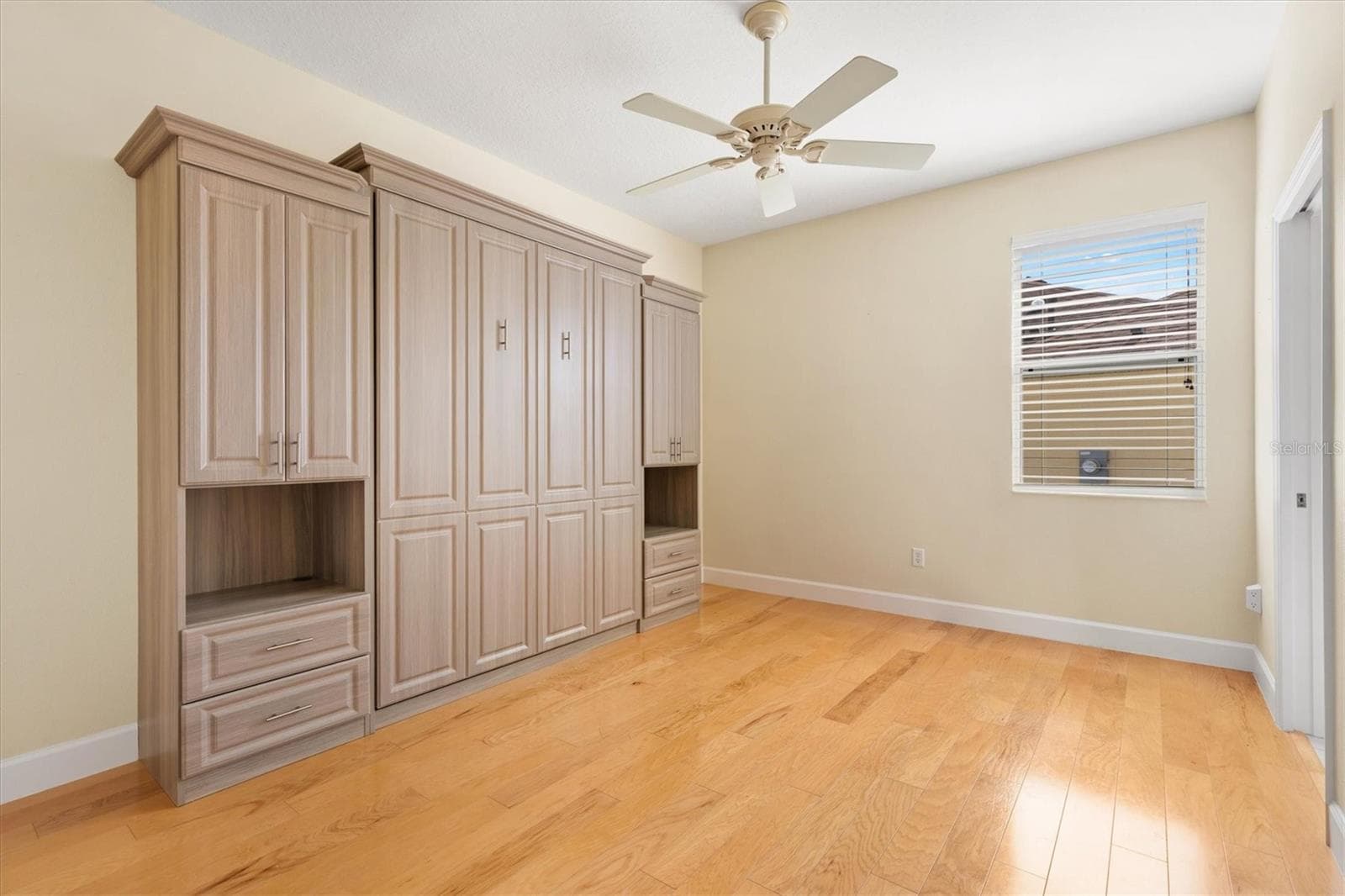 BEDROOM #3*CUSTOM BUILT-IN MURPHY BED WITH CABINETS AND DRAWERS - 1025 WINNSBORO DR, THE VILLAGES