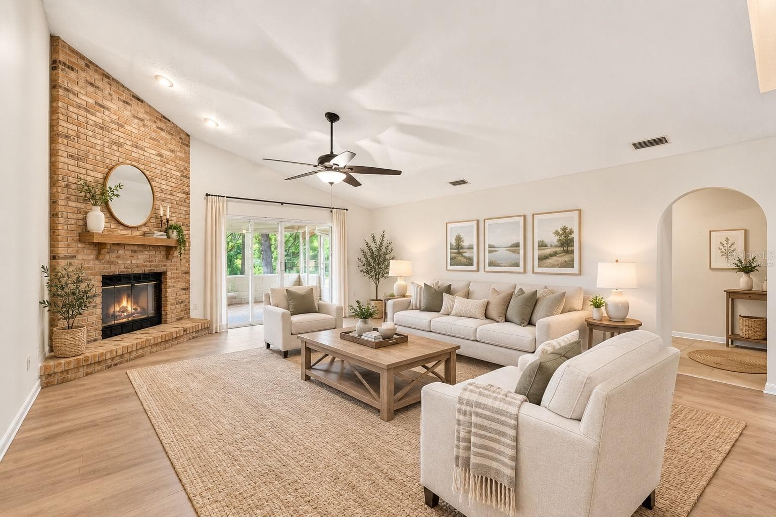 Virtually Staged Living Room with Woodburning Fireplace - 37130 COUNTY ROAD 439, EUSTIS