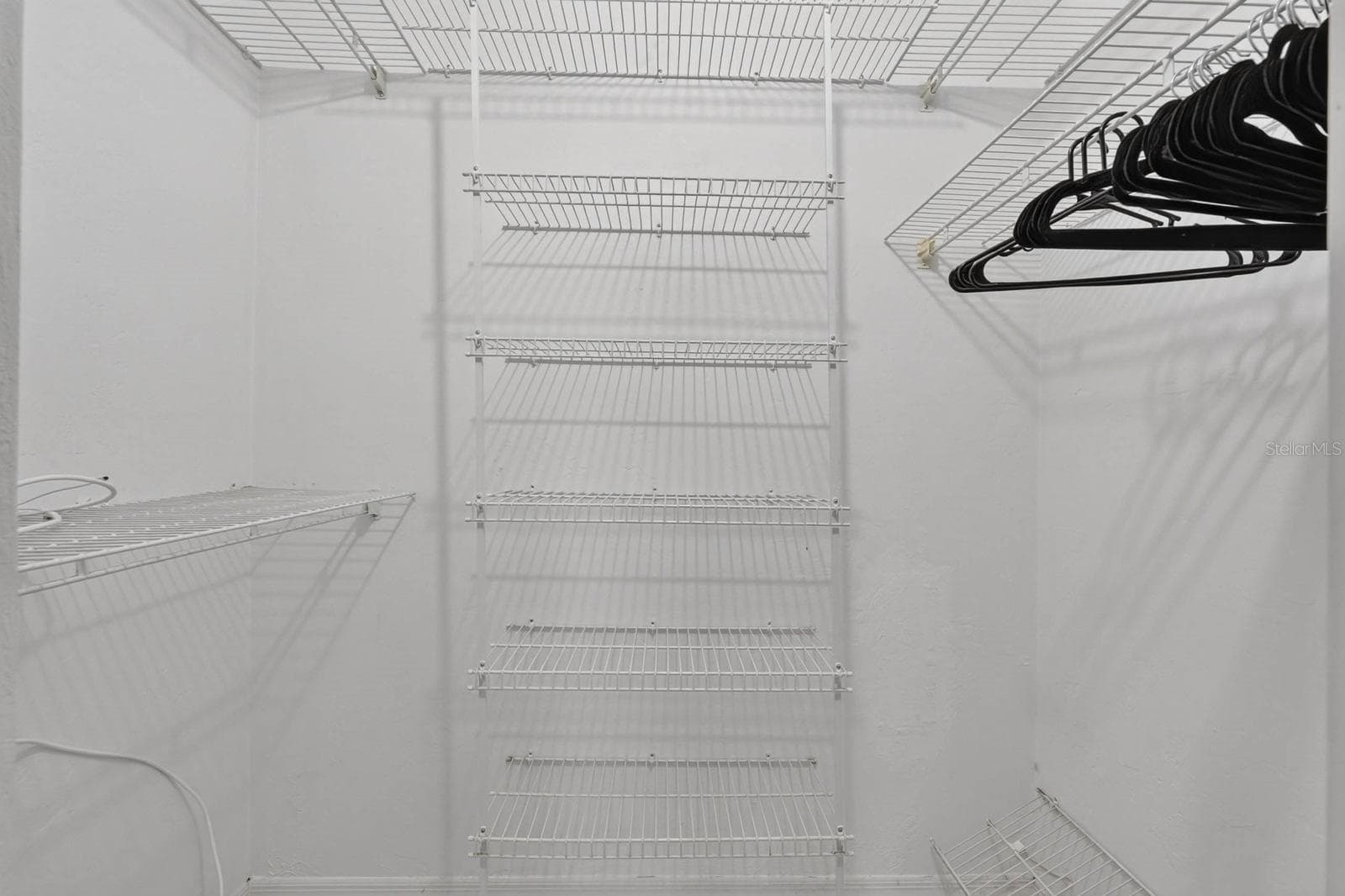 Walk-In Closet - 319 QUAKER RIDGE DR, DAYTONA BEACH
