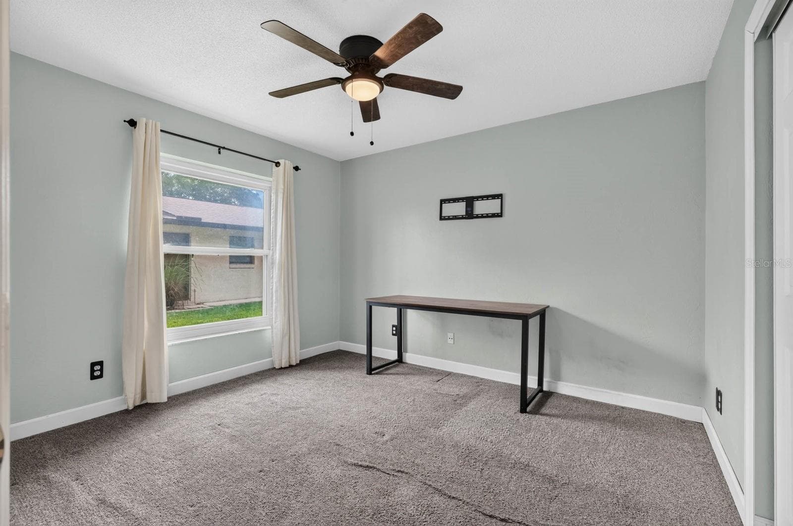Bedroom with Gray Walls - 319 QUAKER RIDGE DR, DAYTONA BEACH