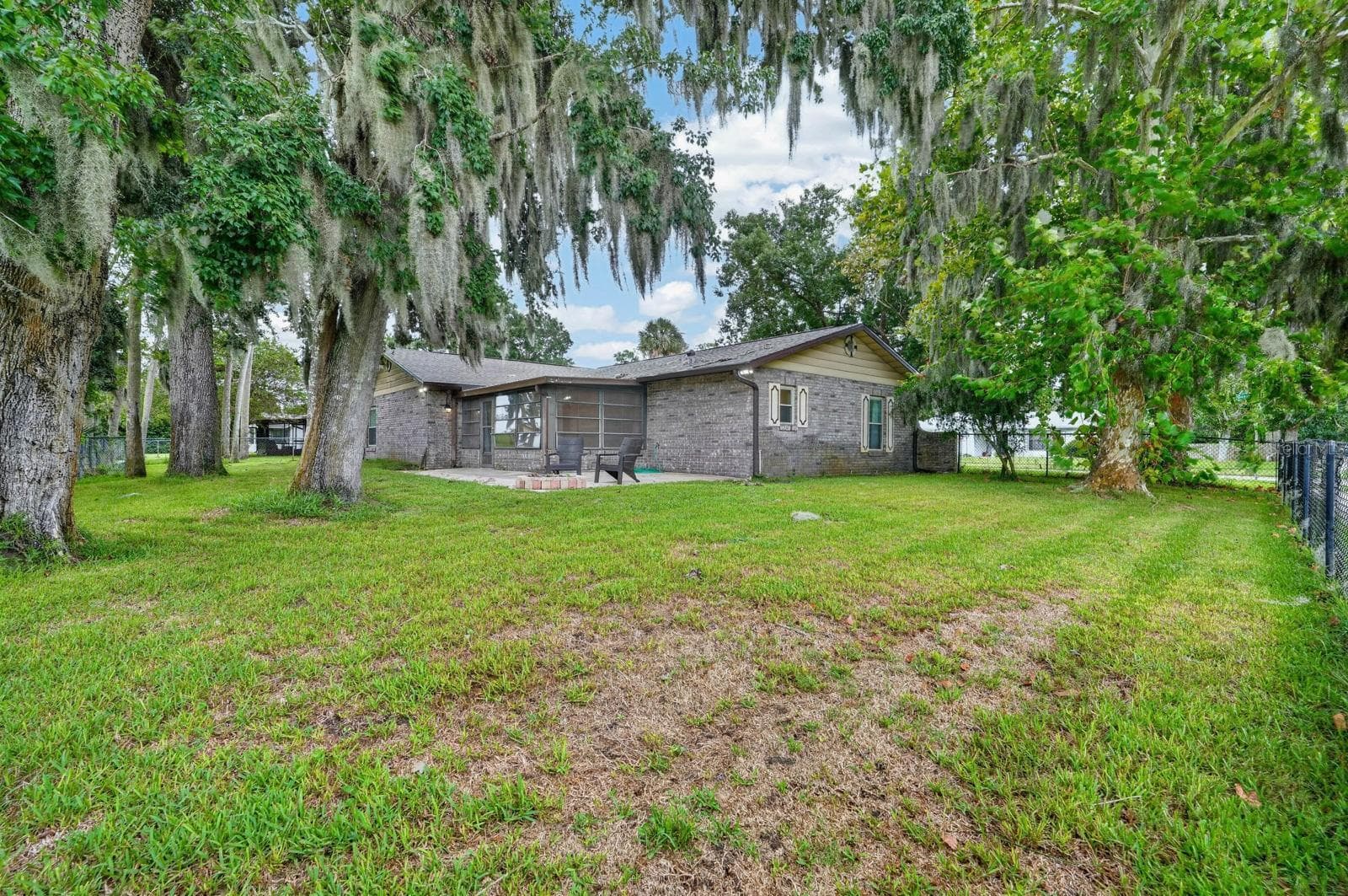 Backyard and Rear Exterior - 319 QUAKER RIDGE DR, DAYTONA BEACH