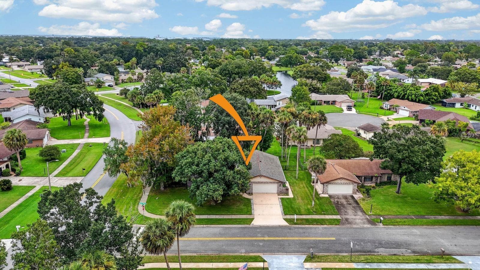 Aerial View with Property Location Marker - 319 QUAKER RIDGE DR, DAYTONA BEACH