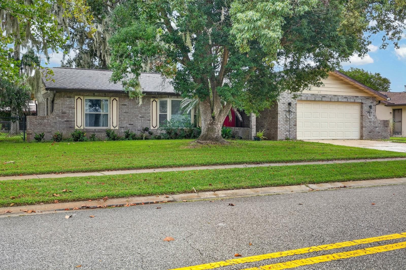 Front Exterior from Street - 319 QUAKER RIDGE DR, DAYTONA BEACH