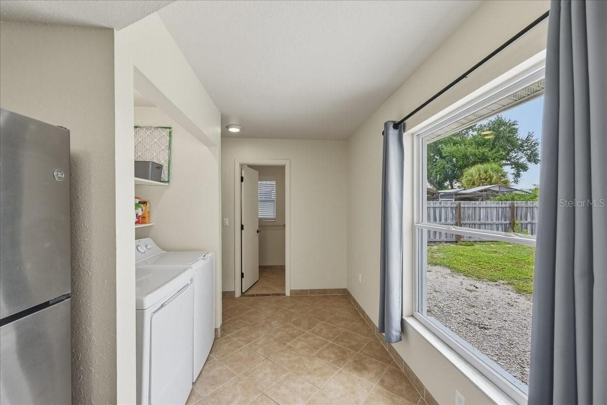 Hall to laundry and second bathroom - 7312 17TH AVE W, BRADENTON
