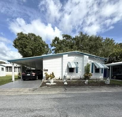 Manufactured Home at 1001 STARKEY RD #190, LARGO, photo 2 of 25
