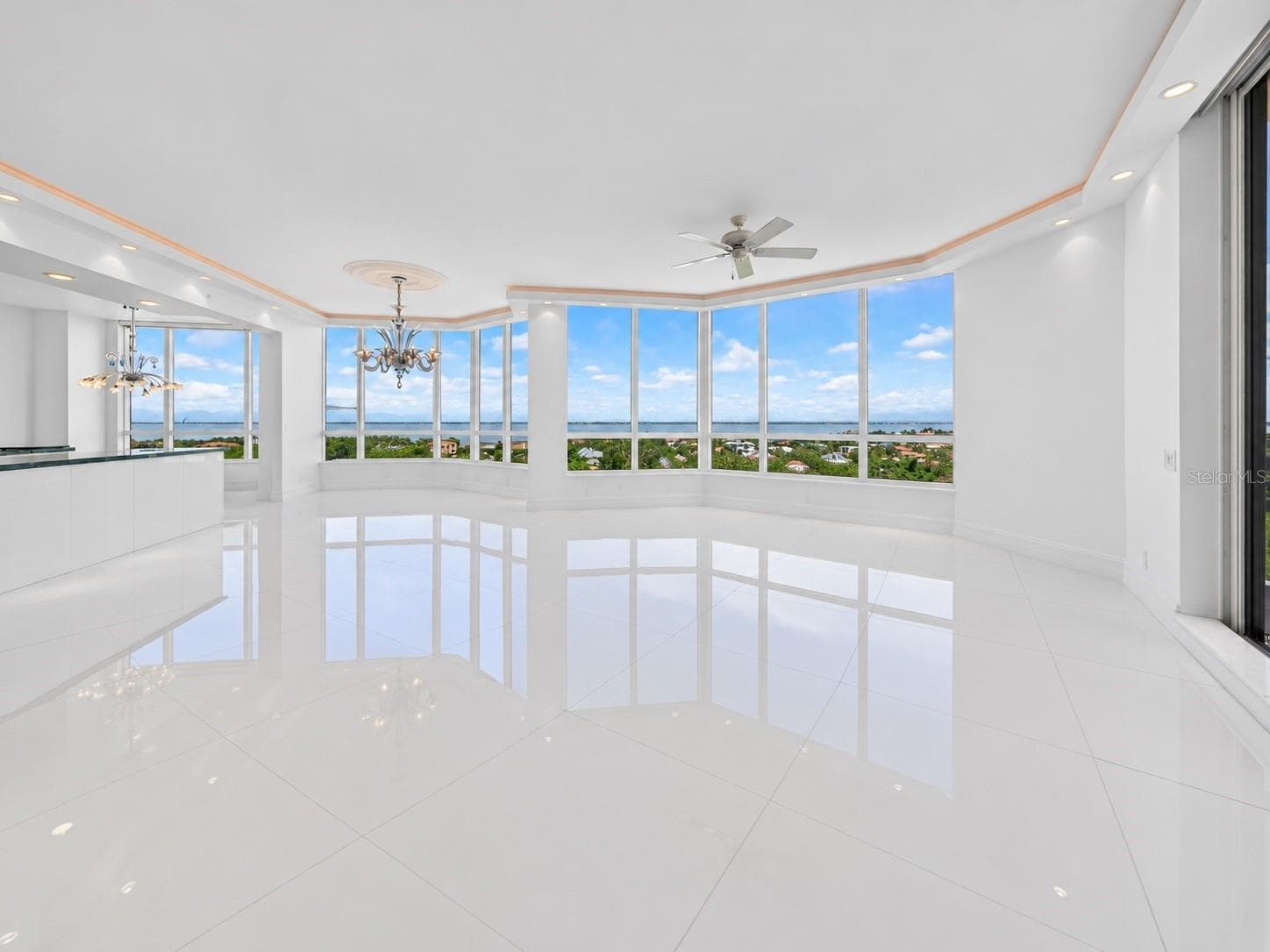 Virtually Vacant - eastern view, dining room and living room. - 1281 GULF OF MEXICO DRIVE DR #707, LONGBOAT KEY