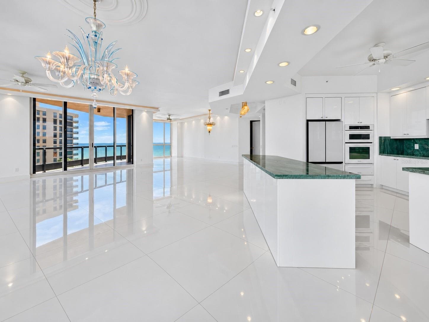 Virtually Vacant - kitchen, dining room and den - 1281 GULF OF MEXICO DRIVE DR #707, LONGBOAT KEY