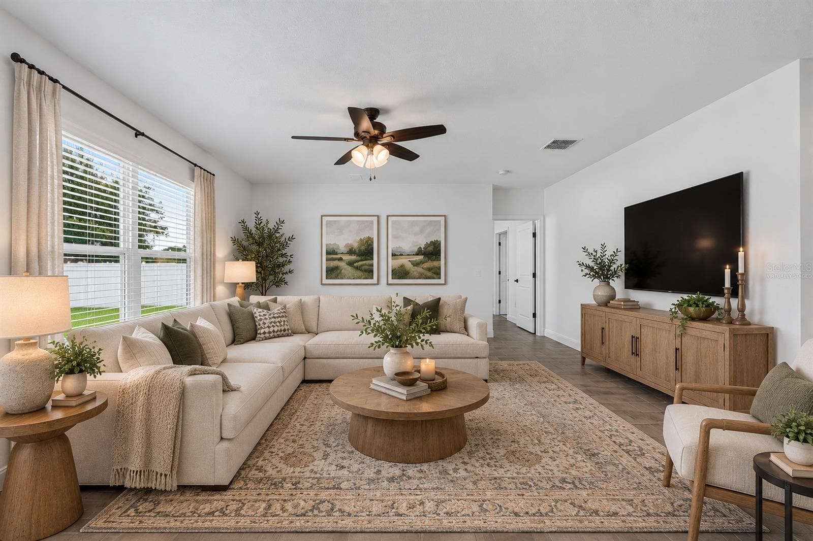 Living Room - Virtually staged - 9637 TRONCAIS CIR, THONOTOSASSA
