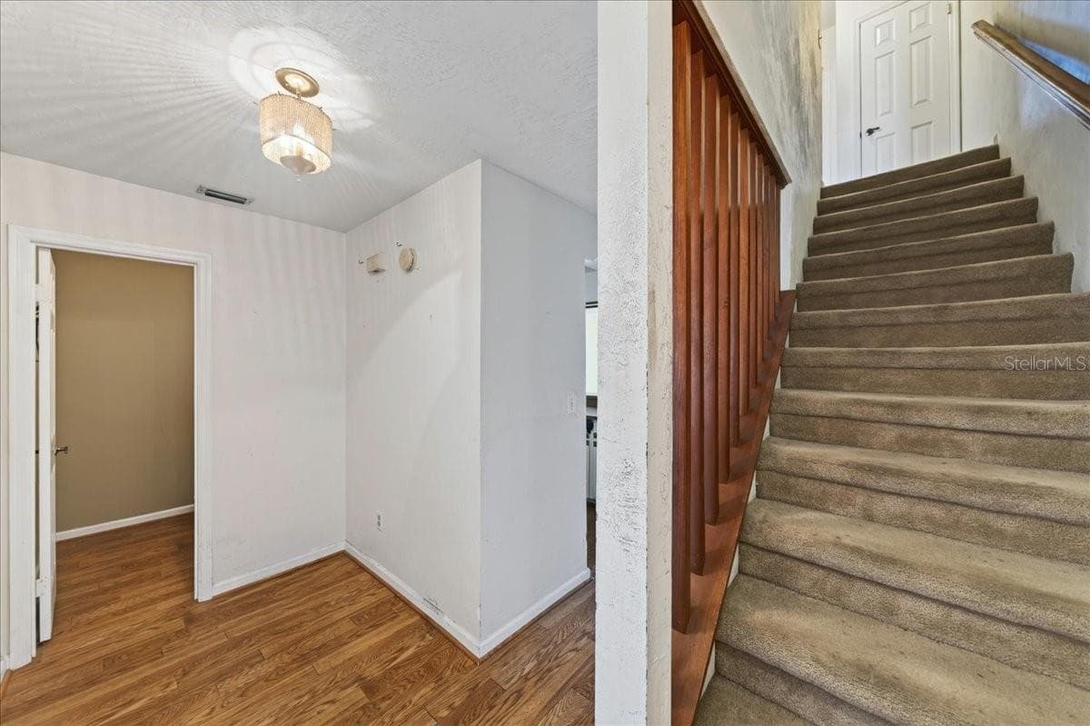 Unit 841 Foyer and stairs to the bedrooms - 841 E 14TH AVE, NEW SMYRNA BEACH